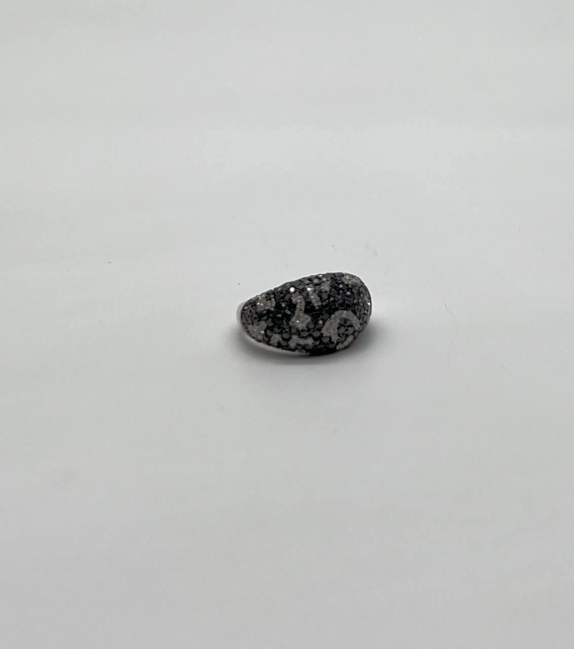 Elegant and Modern.
Adorned with Intricate Black and White Diamonds.
Crafted with Precision and Care.
14K White Gold 
1.50 CTW Natural Diamonds