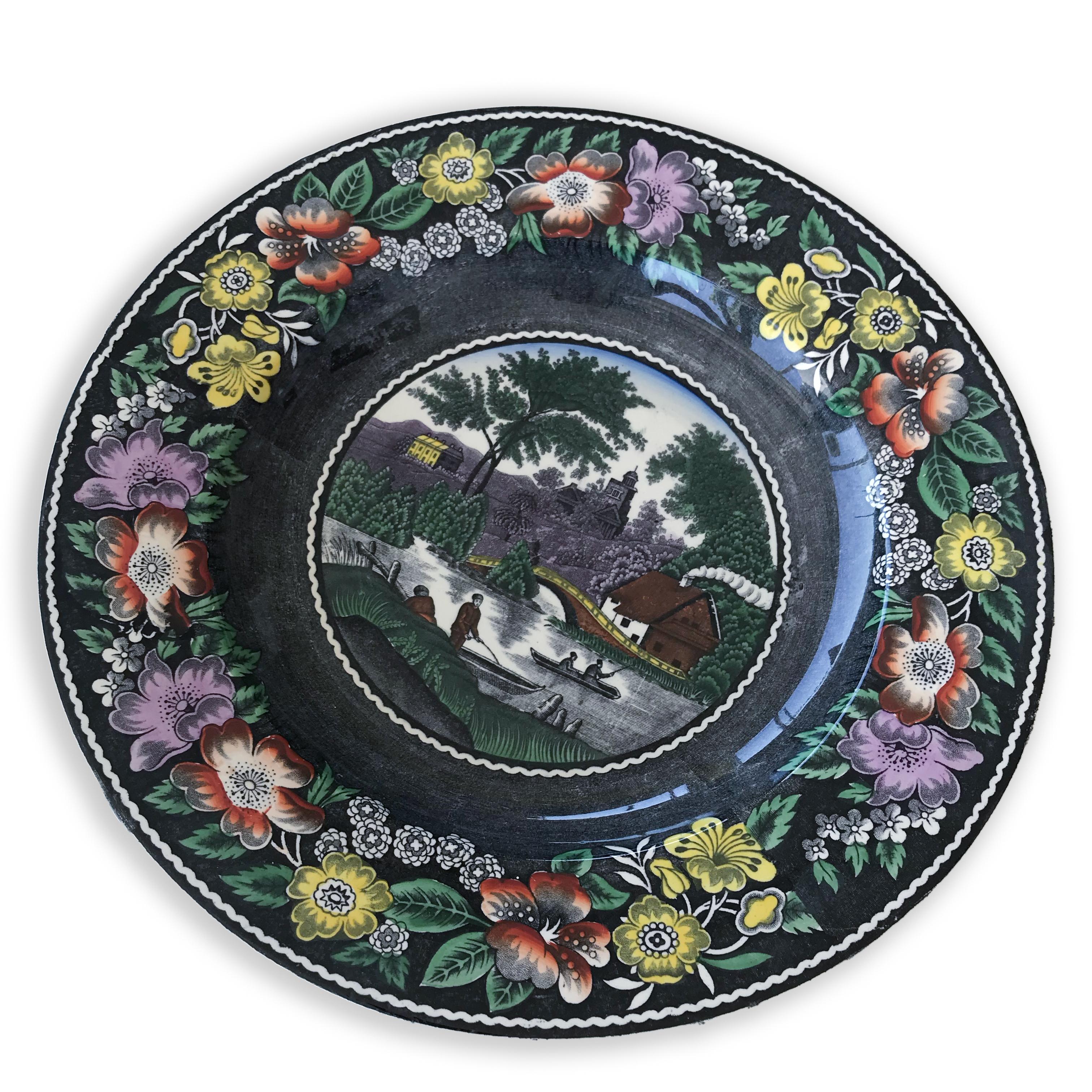 Stunning wall plate by Société Ceramique Maestricht. Made in Holland.
The plate has a beautiful black & white decor called Wilde Rose with hand painted accents in pink, yellow, green. 
The Wilde Rose decor was produced between 1856 and 1909. 
The