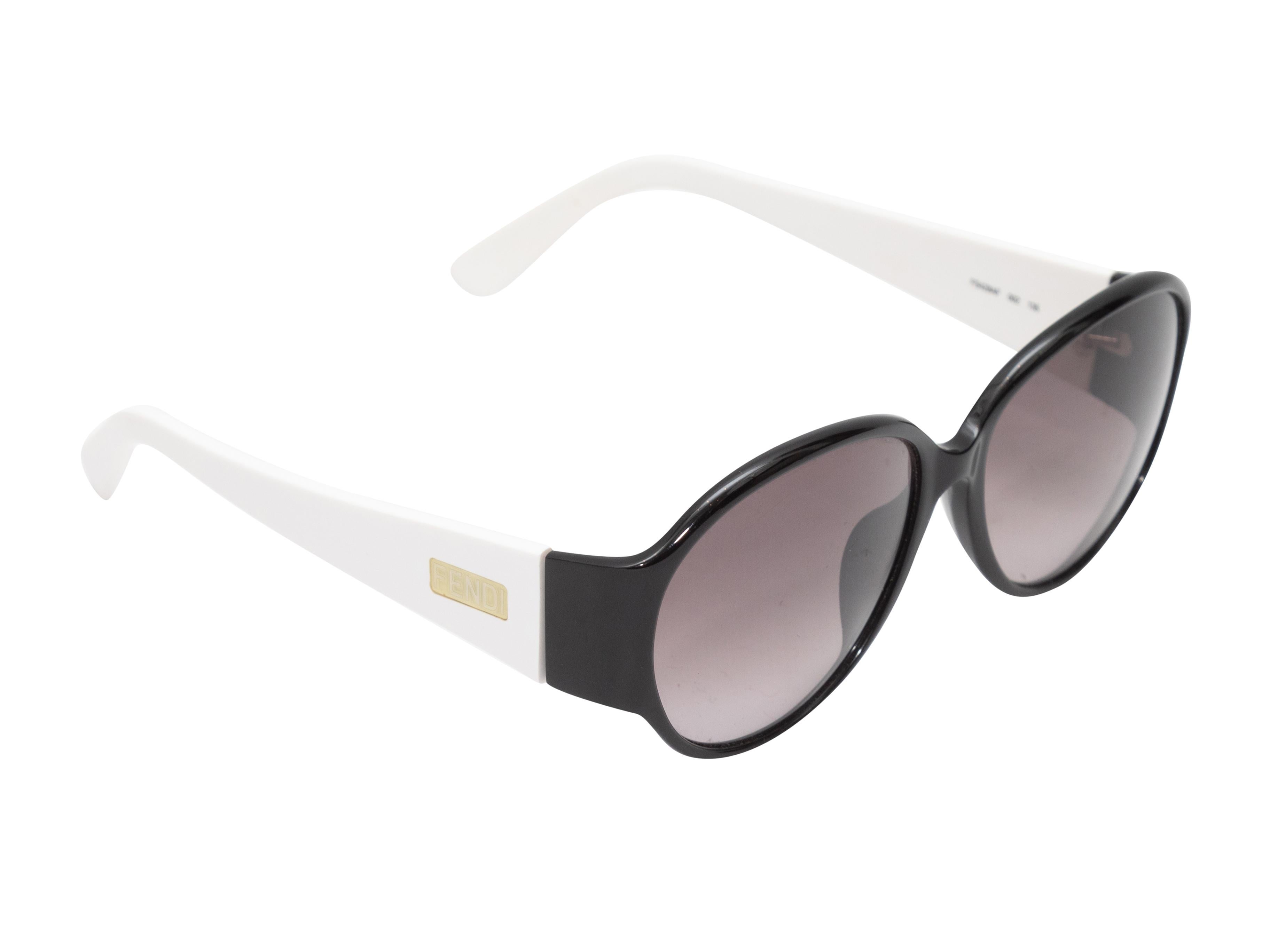 Black and white acetate sunglasses by Fendi. Grey tinted lenses. 2.25