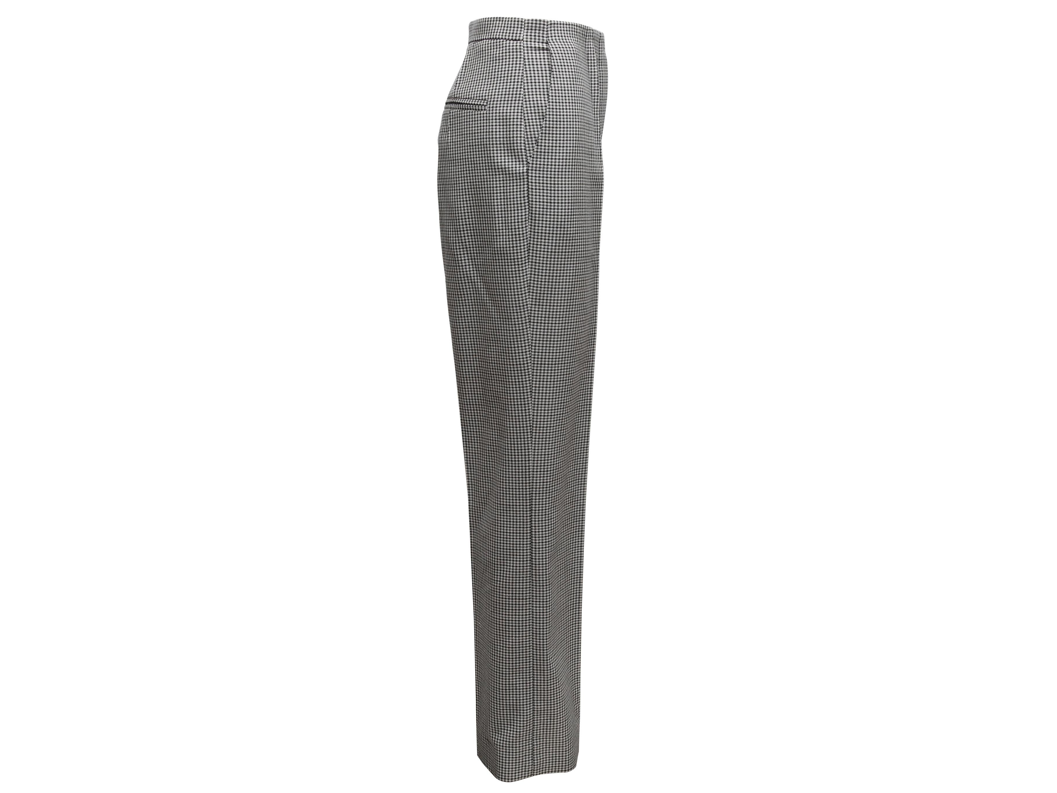  Black and white virgin wool houndstooth straight-leg trousers by Fendi. Four pockets. 28