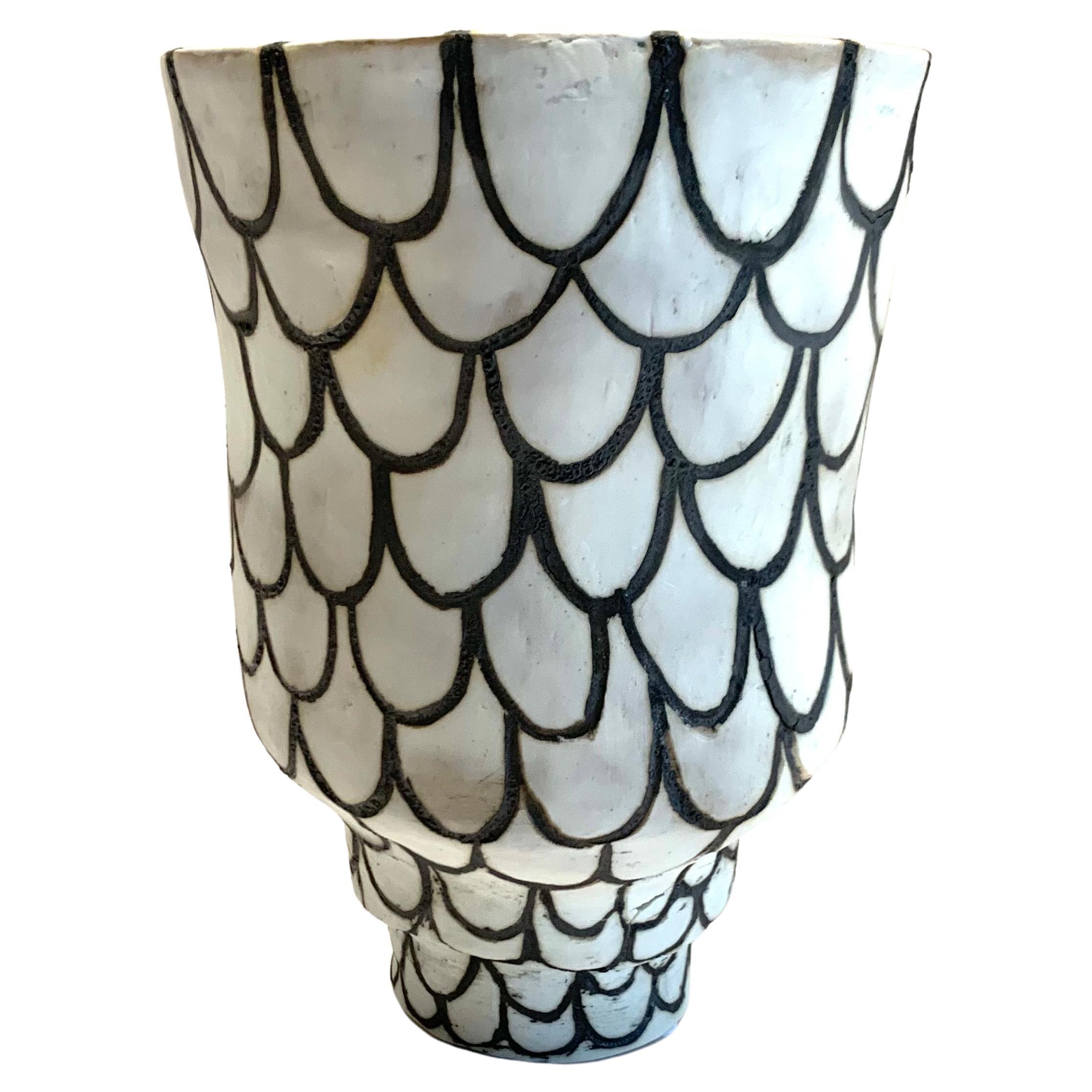 Contemporary American ceramicist Brenda Holzke hand made unique one of a kind stoneware vase that made of dark stoneware and porcelain slip.
Fish Scale design.