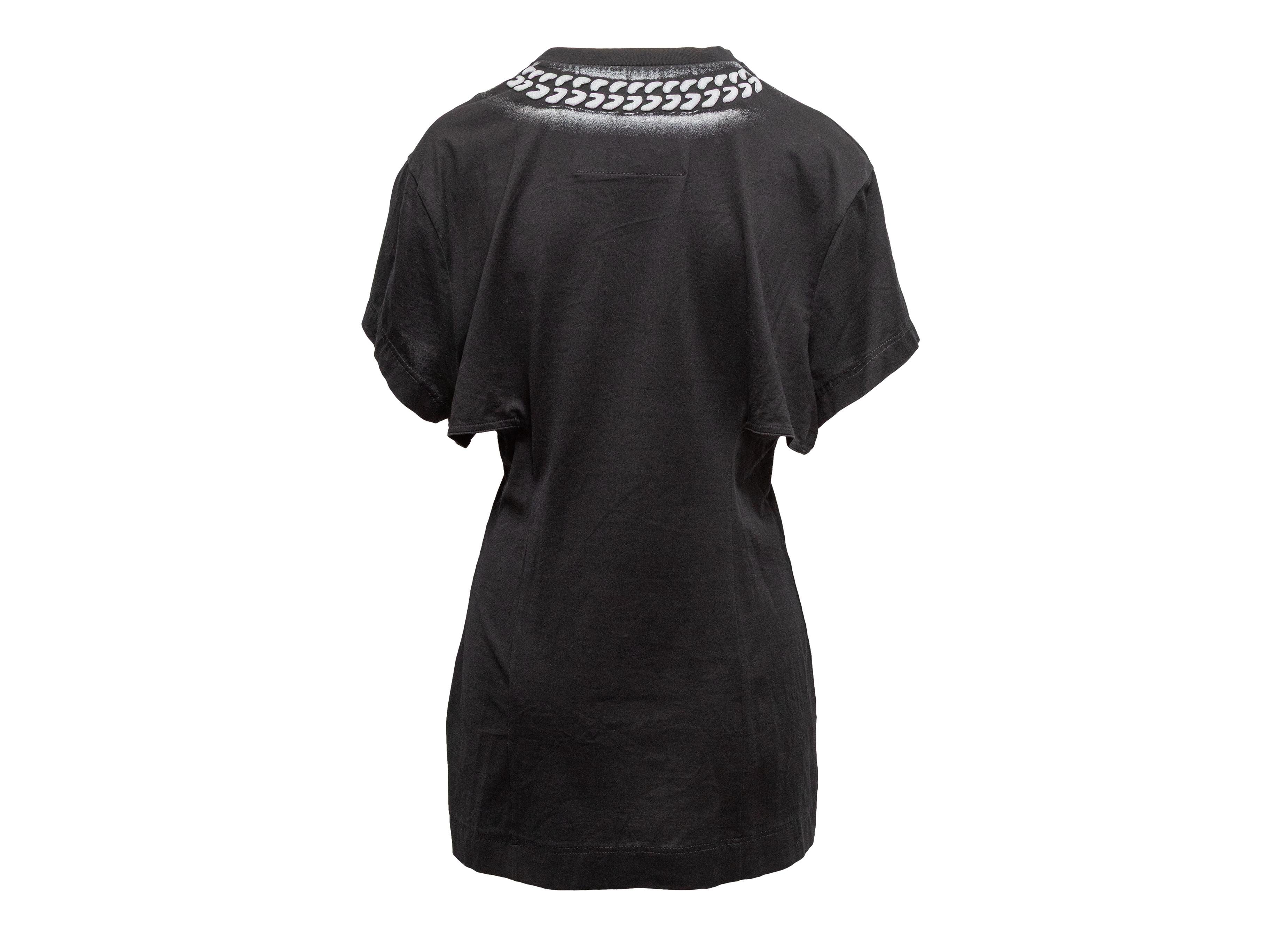 Mini abito in cotone bianco e nero di Givenchy. Girocollo. Maniche corte. Ritagli ai lati. Seno 38