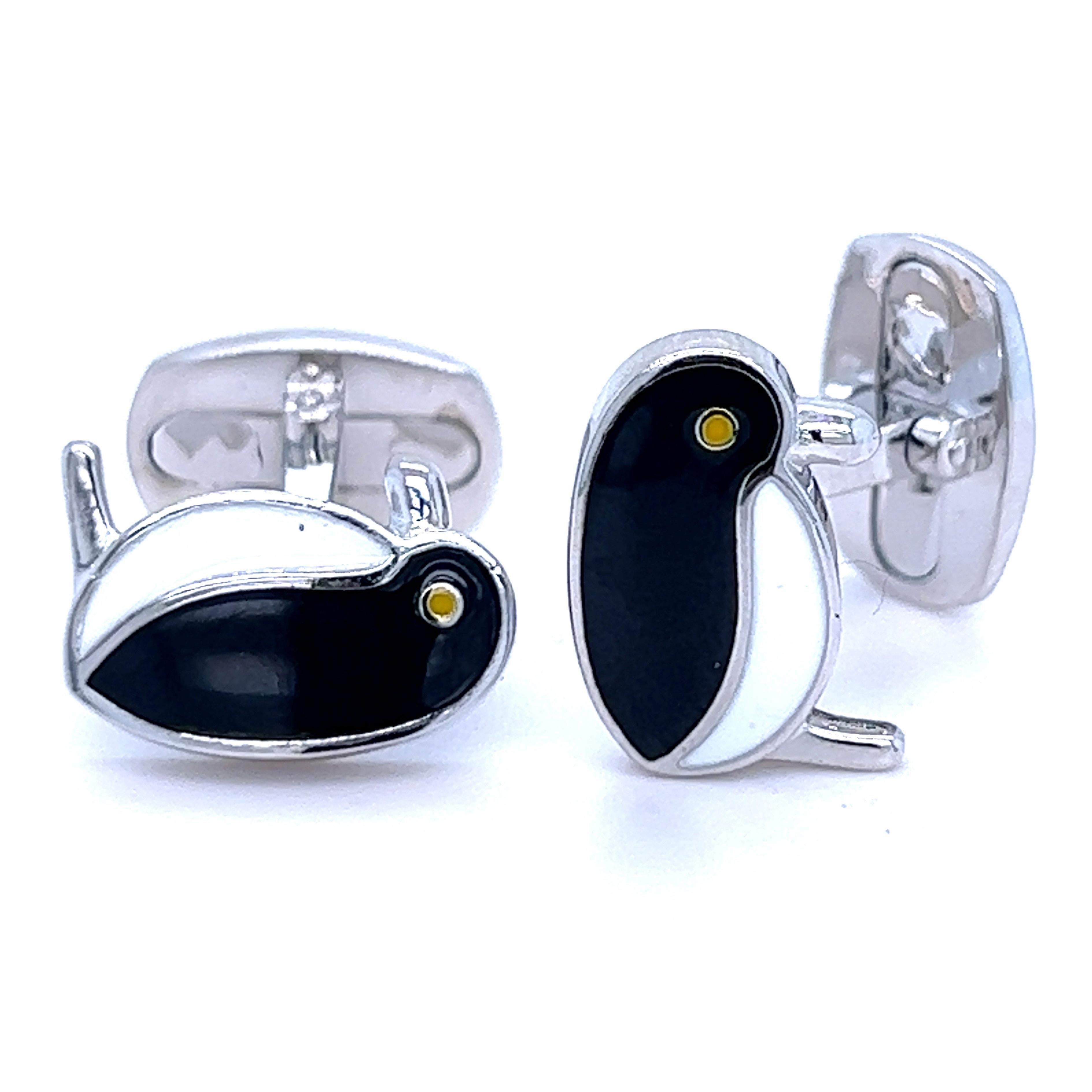 Chic, Unique yet Timeless, Black and White Hand Enamelled Little Penguin Shaped T-Bar Back, Sterling Silver Cufflinks.
In our smart suede tobacco leather case and pouch.
