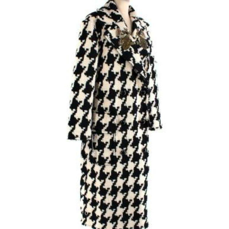 Dolce & Gabbana black & white houndstooth boucle wool coat
 
 
 
 - Giant houndstooth motif in mid-weight boucle wool cloth
 
 - Tulle backed 
 
 - Double-breasted cut with wide labels and faux-button popper fastening
 
 - Patch hip pockets
 
 -