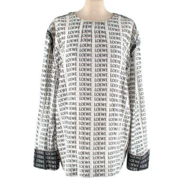 Loewe Black & White Logo Print Open-Back Cotton Blouse
 

  - Allover monochrome logo with contrasting cuffs
 - Boxy silhouette with raw, round neck
 - Fully open back with self-tie fastening at the nape 
 

 Please note, this item is a sample piece