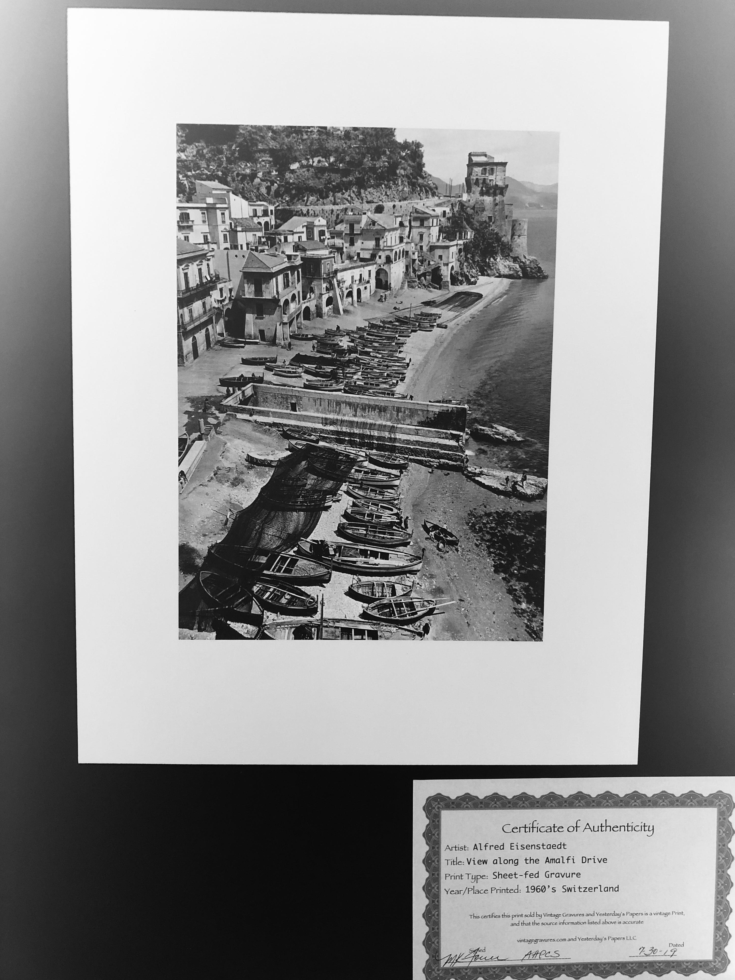 Offered is a black and white sheet-fed gravure photograph of Amalfi Drive 1960s and printed in Switzerland in the 1960s. The print is attached to a white linen mat board (dimensions: 14