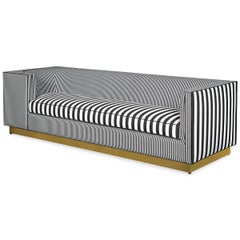 Black and White Striped Asymmetrical Sofa with Brass Toe Kick Base