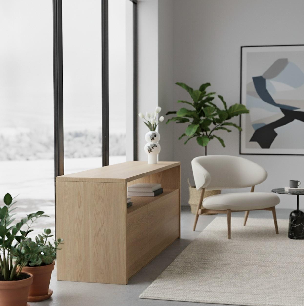 A white and black vase designed by Inger Persson at Rörstrand. The vase is 30 cm (12