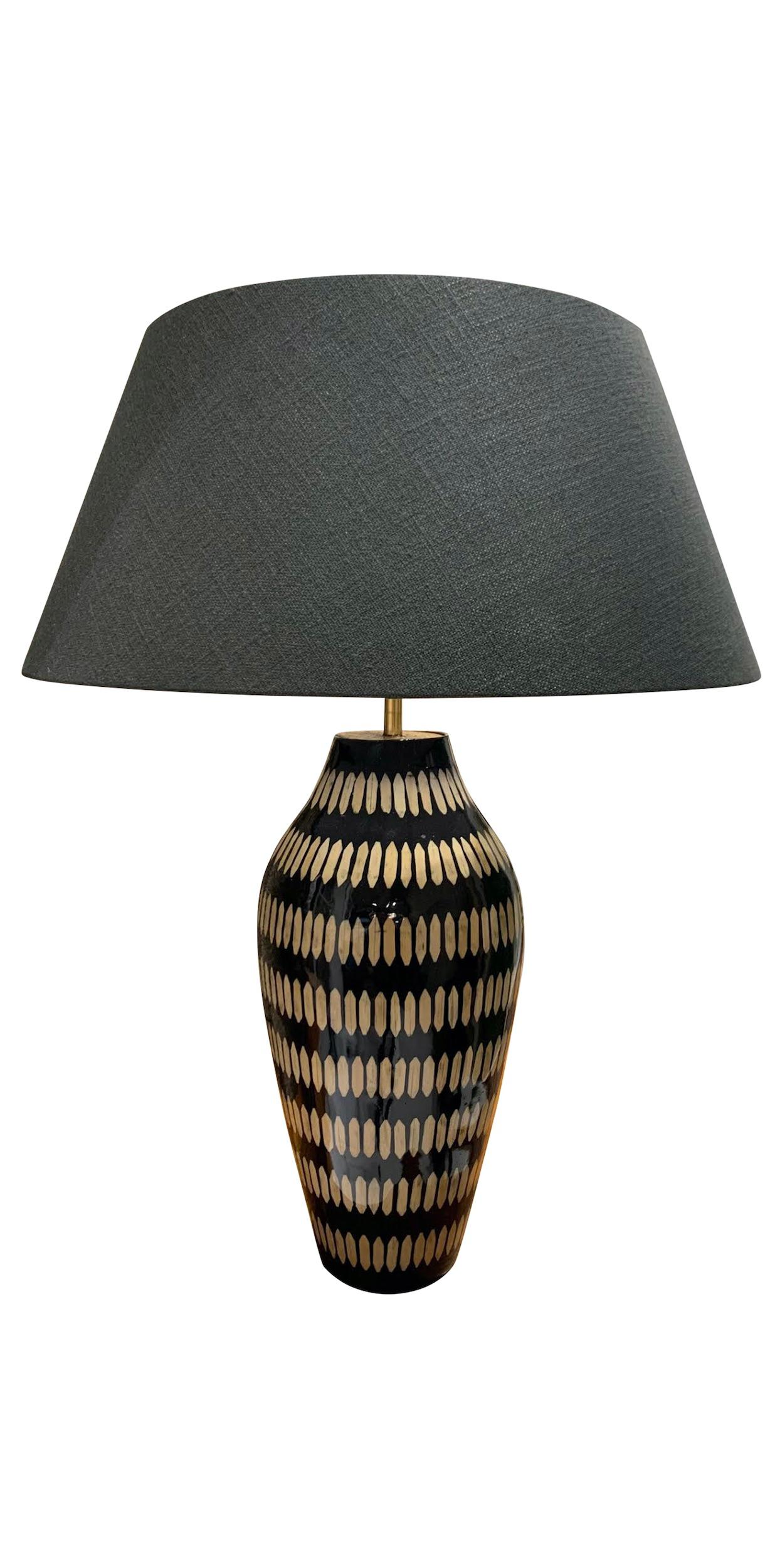 Contemporary Chinese pair of lacquered bamboo lamps.
Black ground with cream vertical dash design.
Base measures 9