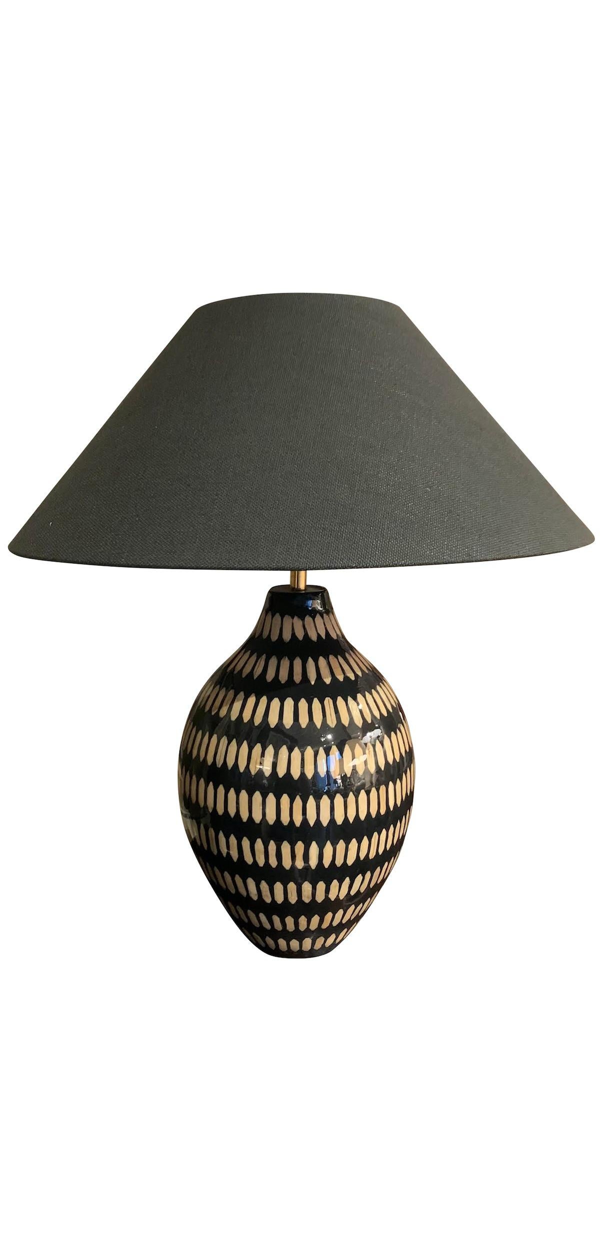 Contemporary Chinese pair of lacquered bamboo lamps.
Black ground with cream vertical dash design.
Base measures 10