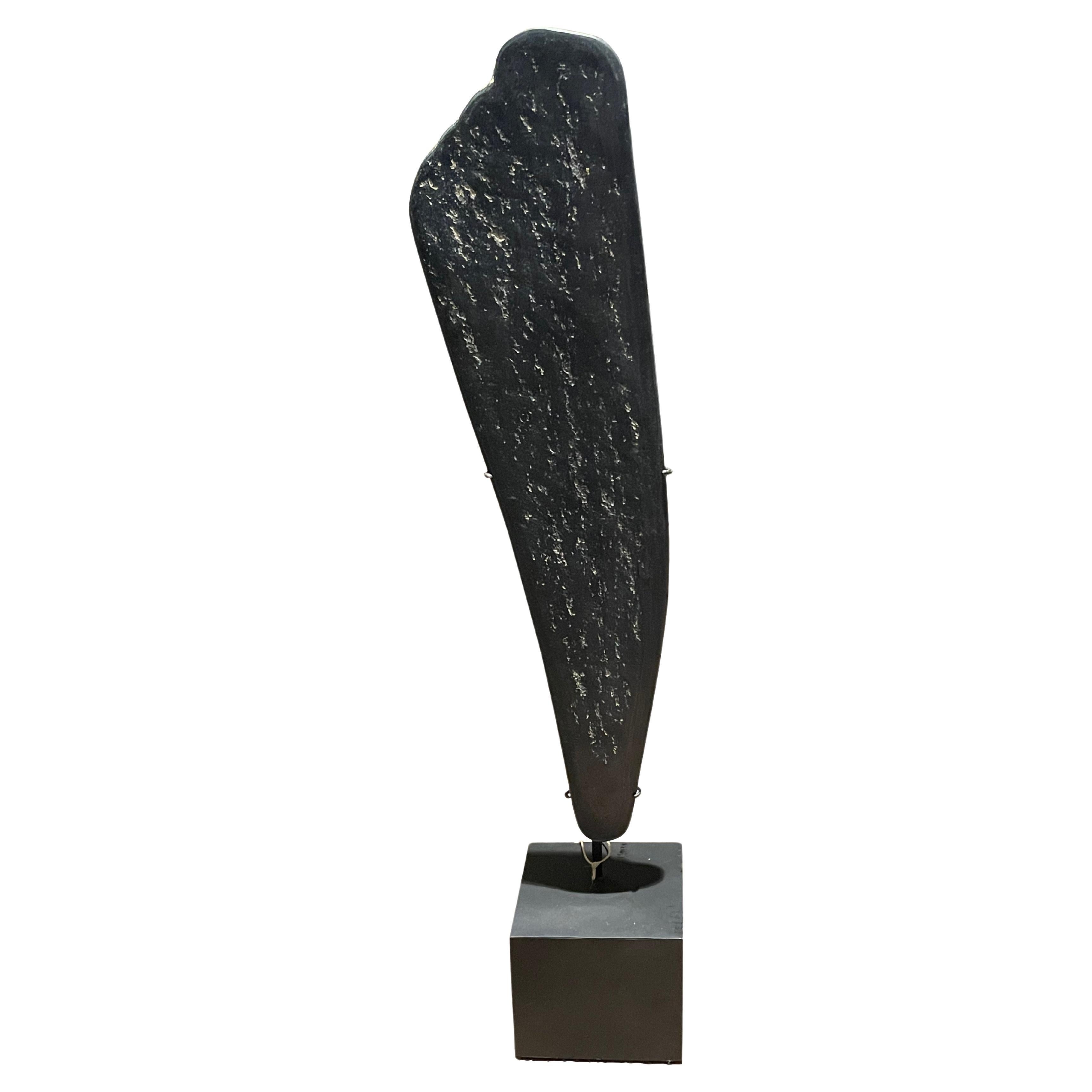 Black With White Markings Stone Paddle Sculpture, Indonesia, 19th Century For Sale