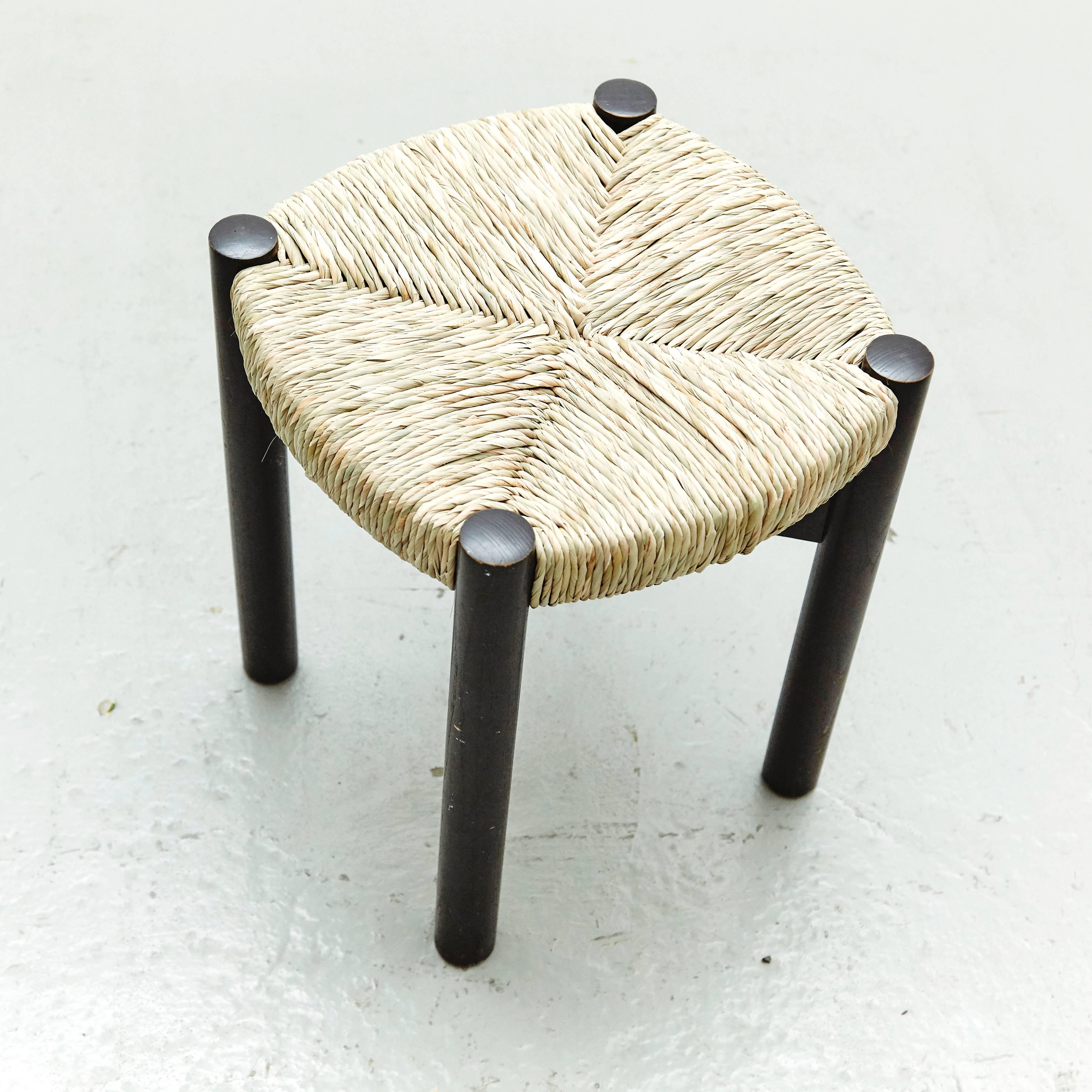 black and rattan stool