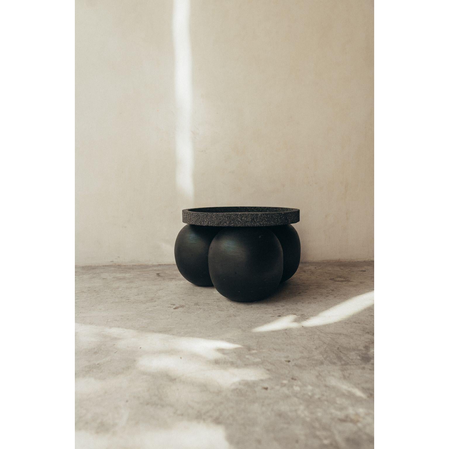 Black wooden balls table with volcanic stone cover by Daniel Orozco
Dimensions: D 20 x H 50 cm
Materials: wood, Volcanic Stone

Daniel Orozco Estudio
We are an inclusive interior design estudio, who love to work with fabrics and natural