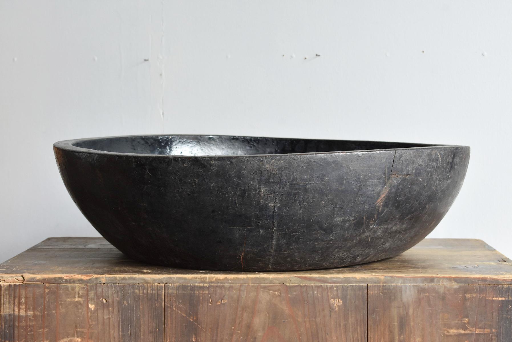 large black wooden bowl