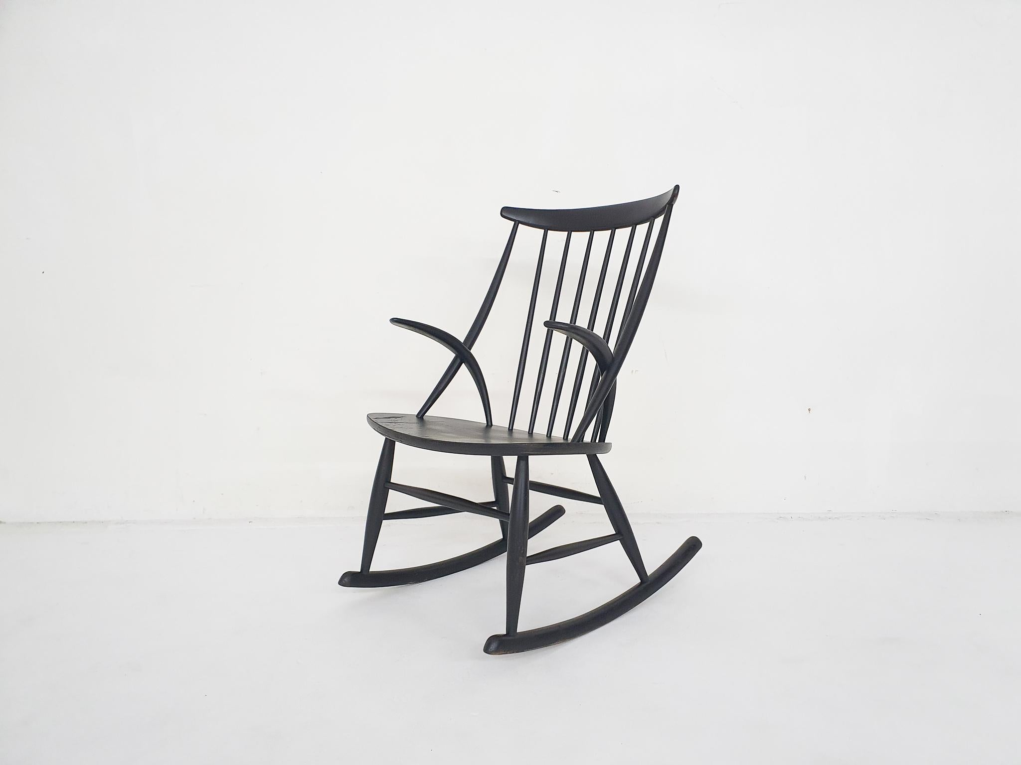 Rocking chair by Illum Wikkelso for Niels Eilersen, model Gyngestol nr 3. The black paint has been repainted.
Marked underneath the seating.