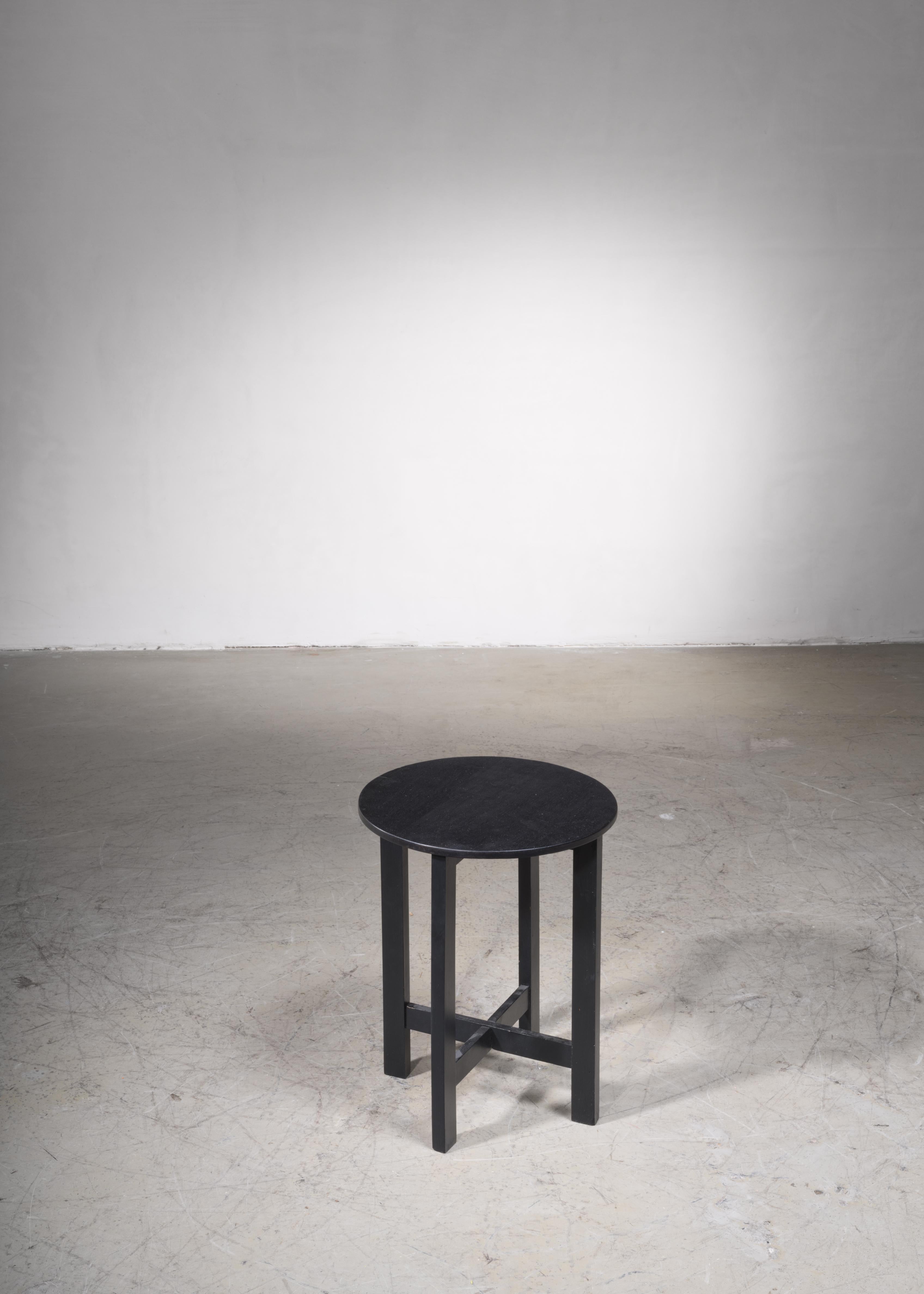 small black wooden stool