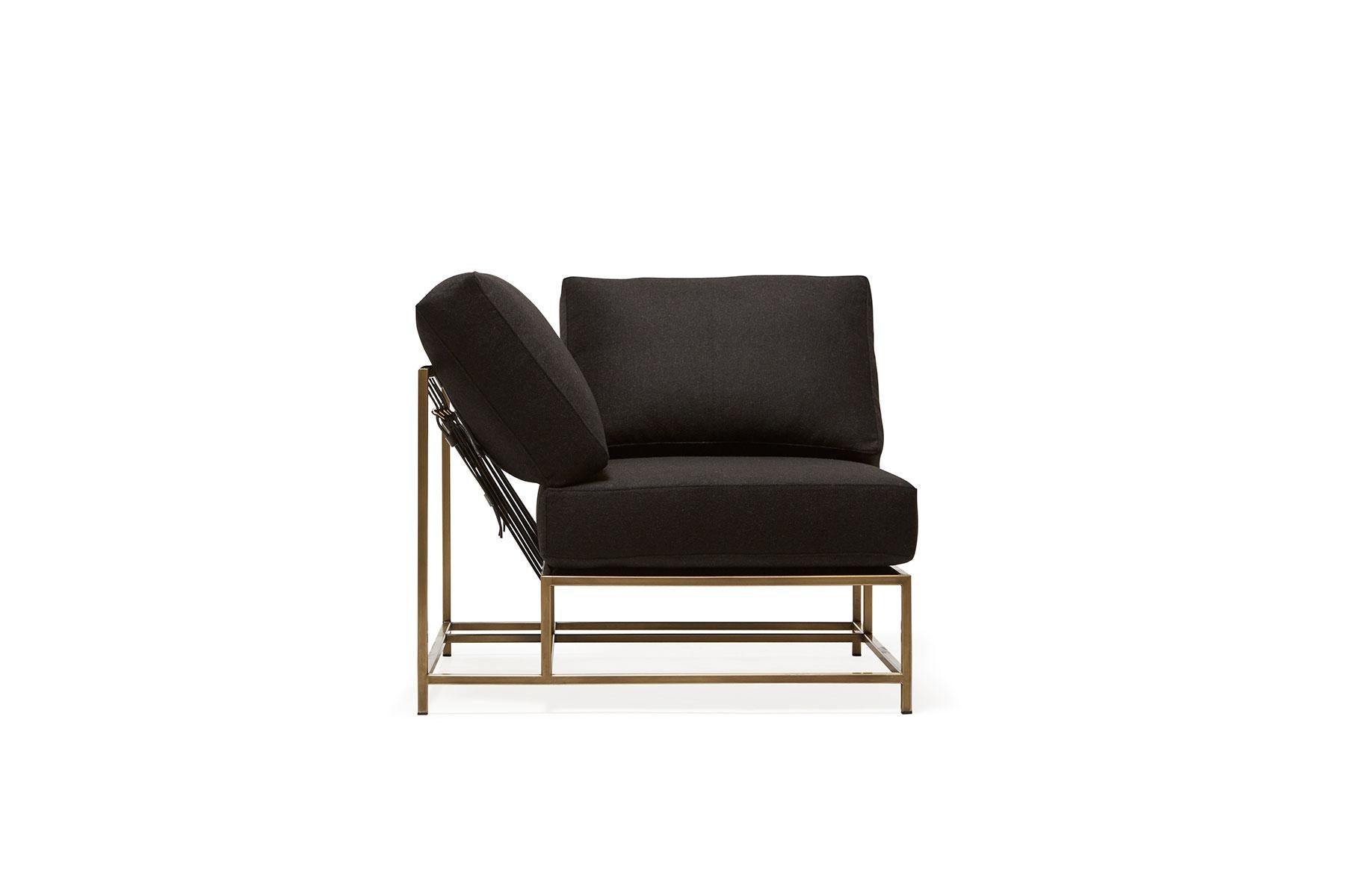 The Inheritance Corner Chair can be used as a standalone piece, or as part of a modular sectional with other Inheritance pieces.

This variation is upholstered in a rich, black wool blend fabric. The foam seat cushions have been wrapped in