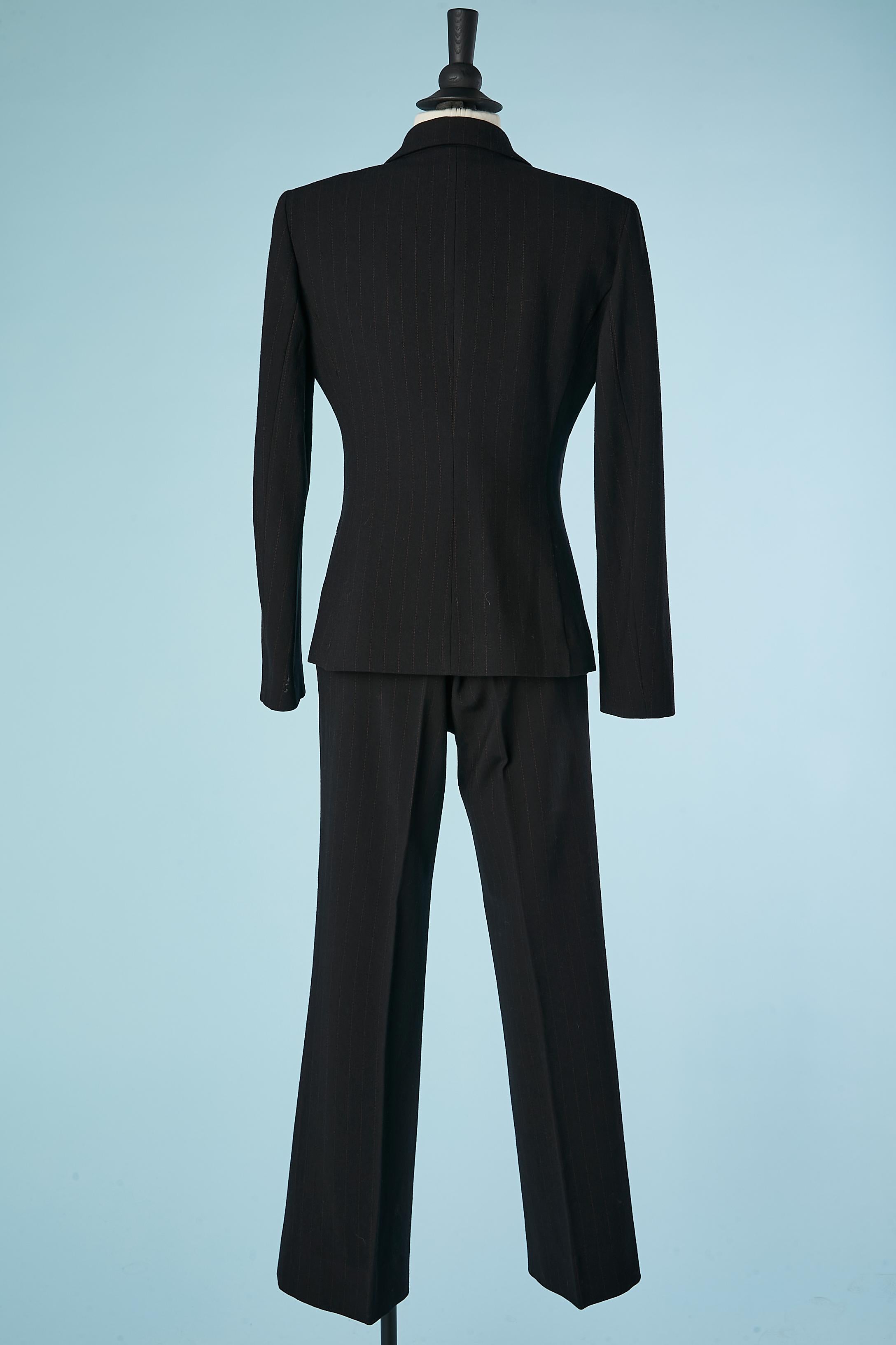 Black wool and red pin-stripe trouser-suit and fur vest Gianfranco Ferré Studio 1