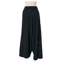 Pantalón ancho asimétrico de lana negra Y'S YOHJI YAMAMOTO.