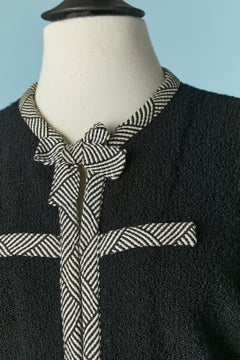Black wool bouclette skirt-suit with black&white braid piping and bow ADOLFO