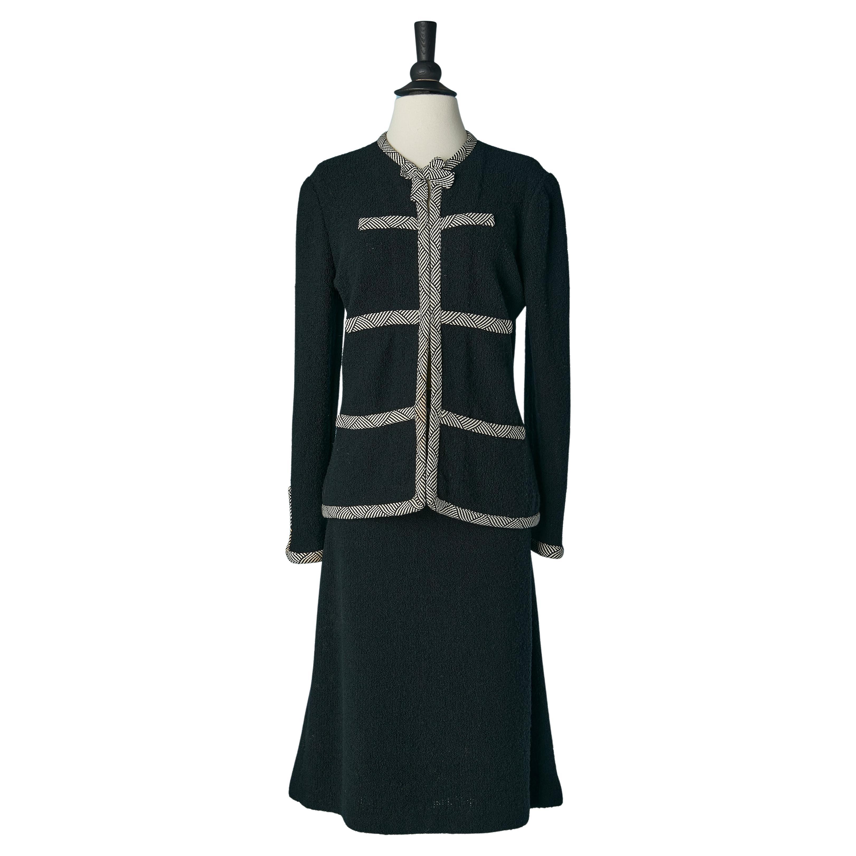 Black wool bouclette skirt-suit with black&white braid piping and bow ADOLFO For Sale