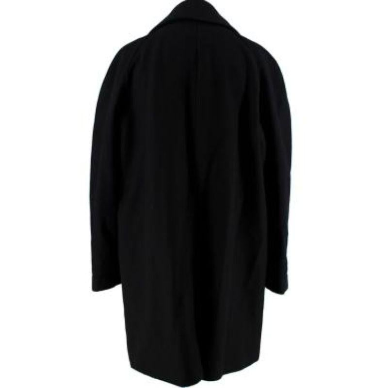 Alexander McQueen black wool car coat
 
 - Car-style coat modernised with a wide zipped lapel and front opening and buttoned placket
 - Warm wool twill body
 - Fully lined 
 
 Made in Italy
 
 No tumble dry
 Professionally dry clean
