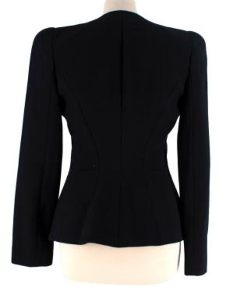 Alexander Black Wool Crepe Collarless Jacket
 

 - Sharply tailored collarless silhouette, with silver-tone metal zip through fastening and signature peplum hip
 - Structured shoulder, fully lined
 

 Materials:
 Shell: 
 57% Rayon
 39% Wool
 4%