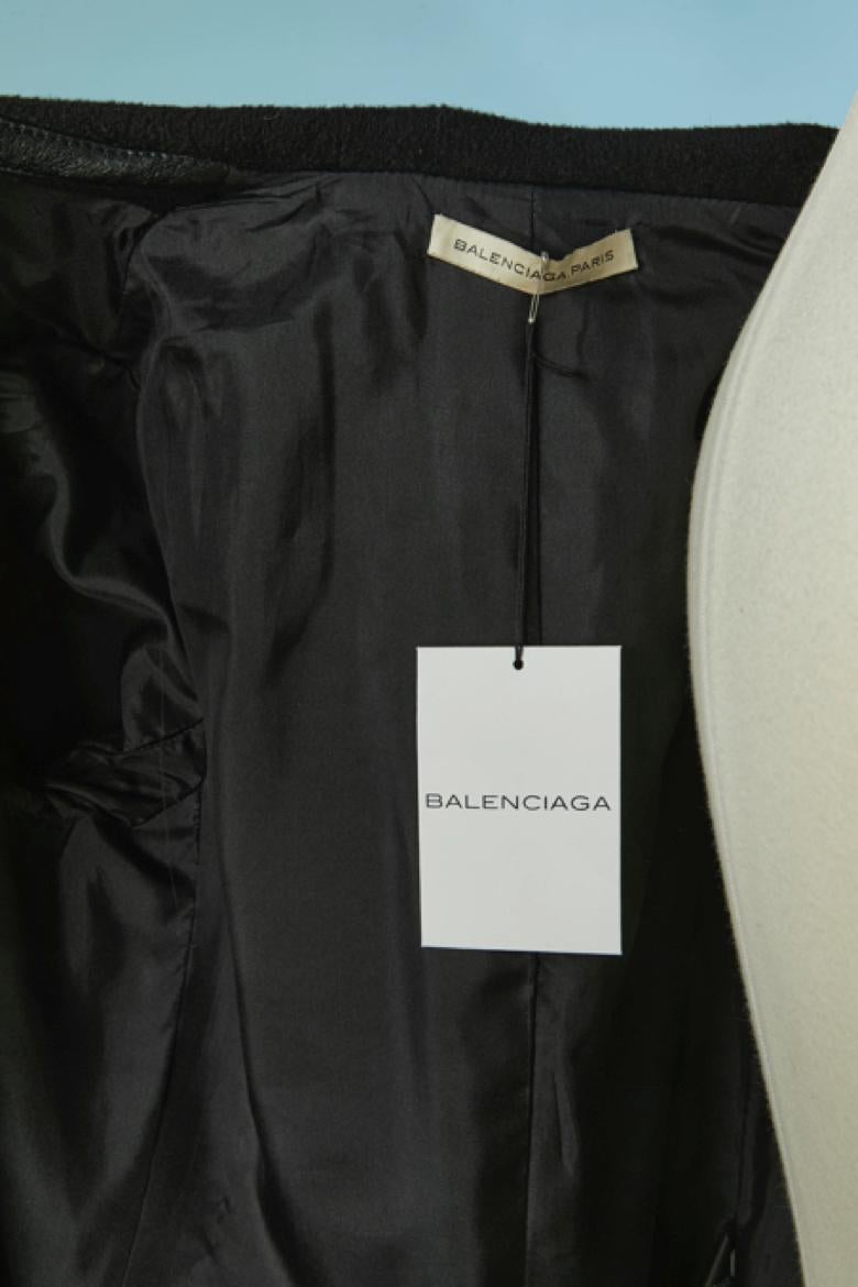 Cappotto doppiopetto in lana nera con profili in pelle BALENCIAGA in vendita 1
