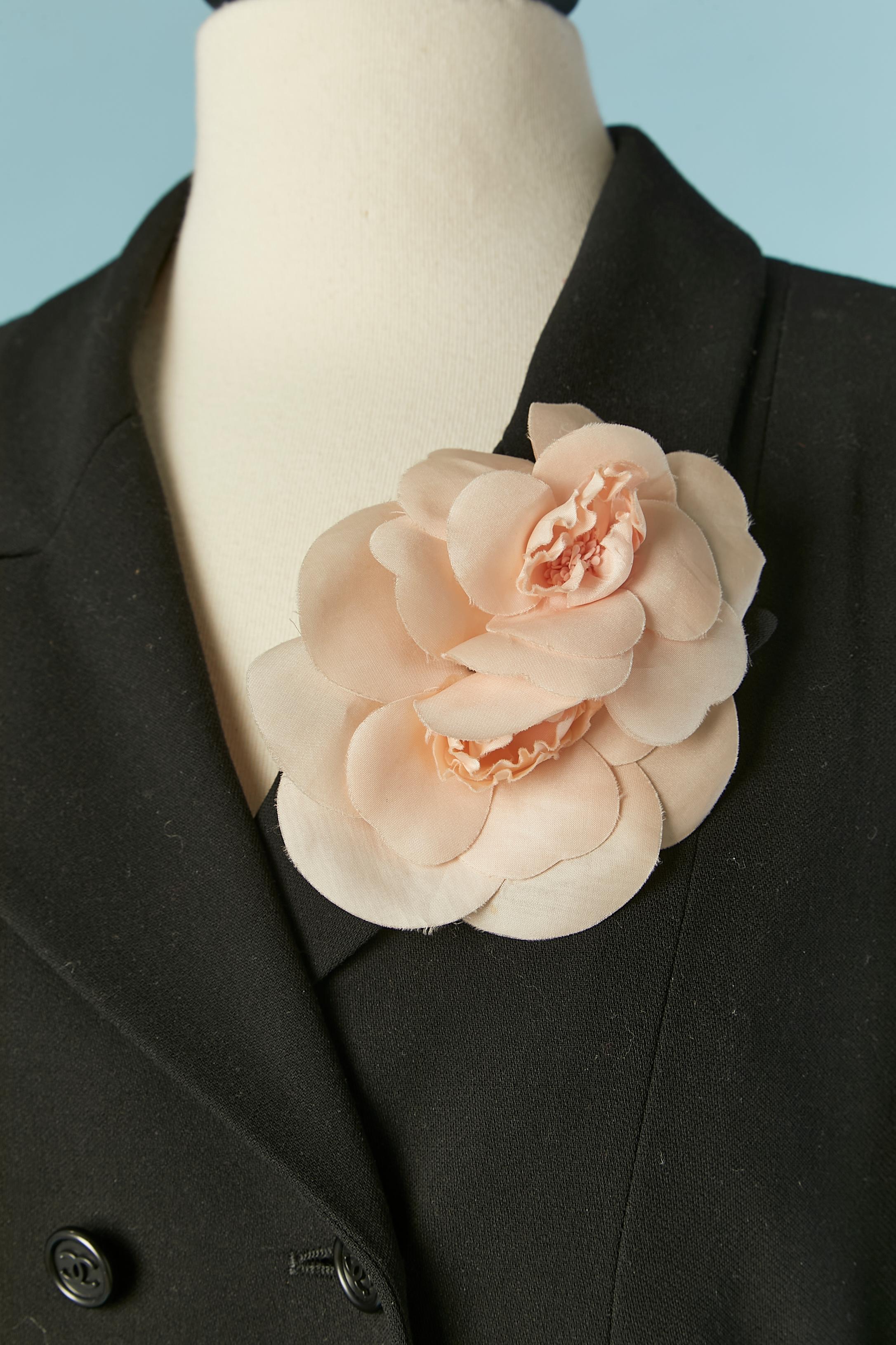Black wool double-breasted coat with silk  Camelia brooches.
Branded jacquard lining composition : 95% silk, 5% lycra.
Shoulder-pads. Pocket on both side. Branded button closure middle front and cuffs.
SIZE 38 (Fr) M 