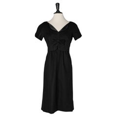 Black wool dress with bow on the bust Mademoiselle Ricci 