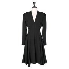 Vintage Black wool dress with pleats on the hips Jacques Fath 