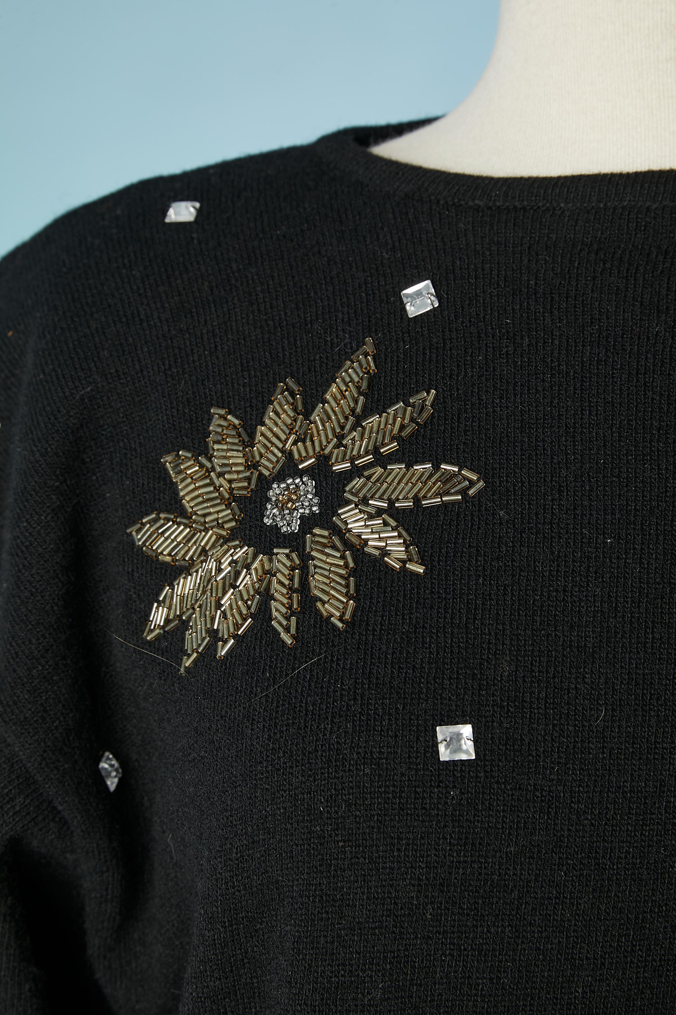 Black wool knit dress with beads embroidery Pierre Cardin Circa 1980's  In Good Condition For Sale In Saint-Ouen-Sur-Seine, FR