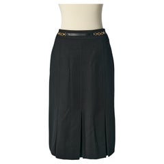 Black wool skirt with box pleats and gold metal buckle on the waist CELINE