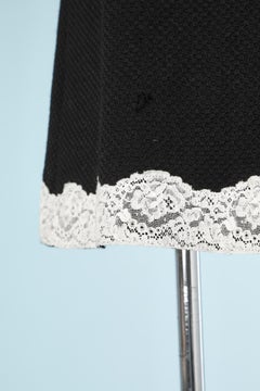 Black wool skirt with white lace edge Chantal Thomass