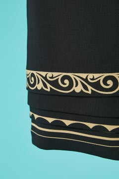 Black wool straight skirt with graphic bottom edge Gianni Versace