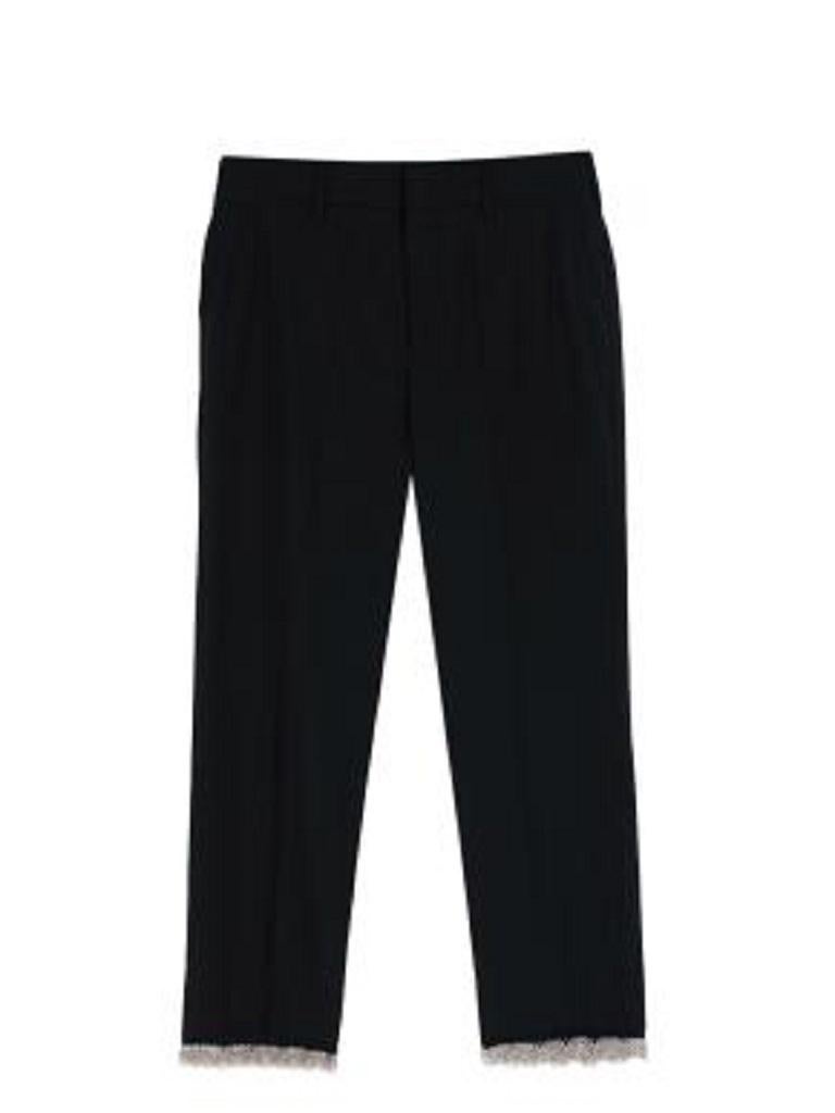 Prada Black Wool Tailored Trousers with Chain Embellished Hem
 

 - Classically tailored slim leg trousers in a light wool flannel, edged with a fine silver-tone chainmail hemline 
 - Zip fly
 - Closed pockets on each side 
 - Two closed pockets in