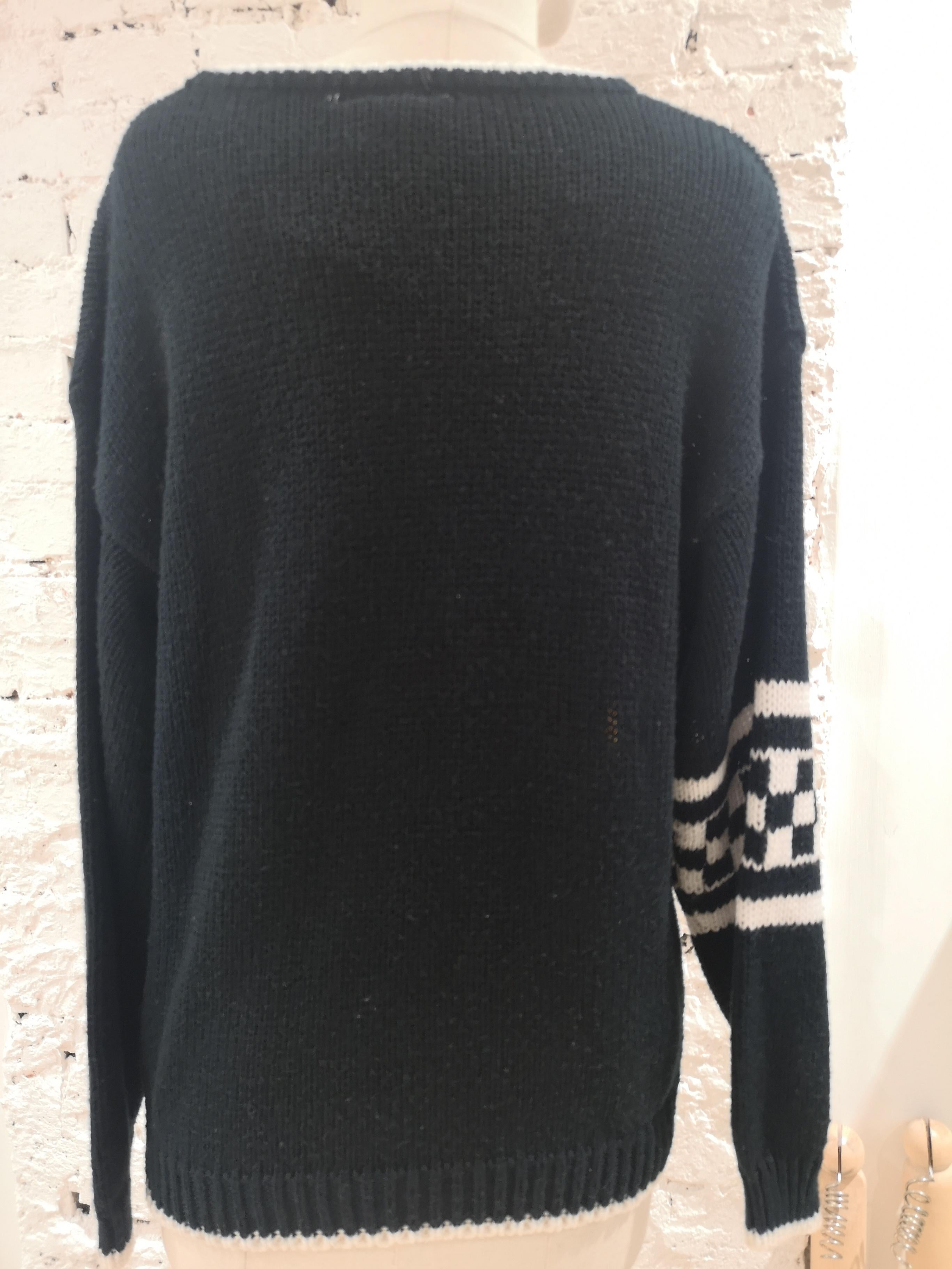 Black wool taxi sweater / pull 1