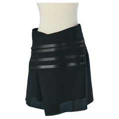 Black wrapped skirt with top stitching satin strap MARITHE + FRANCOIS GIRBAUD