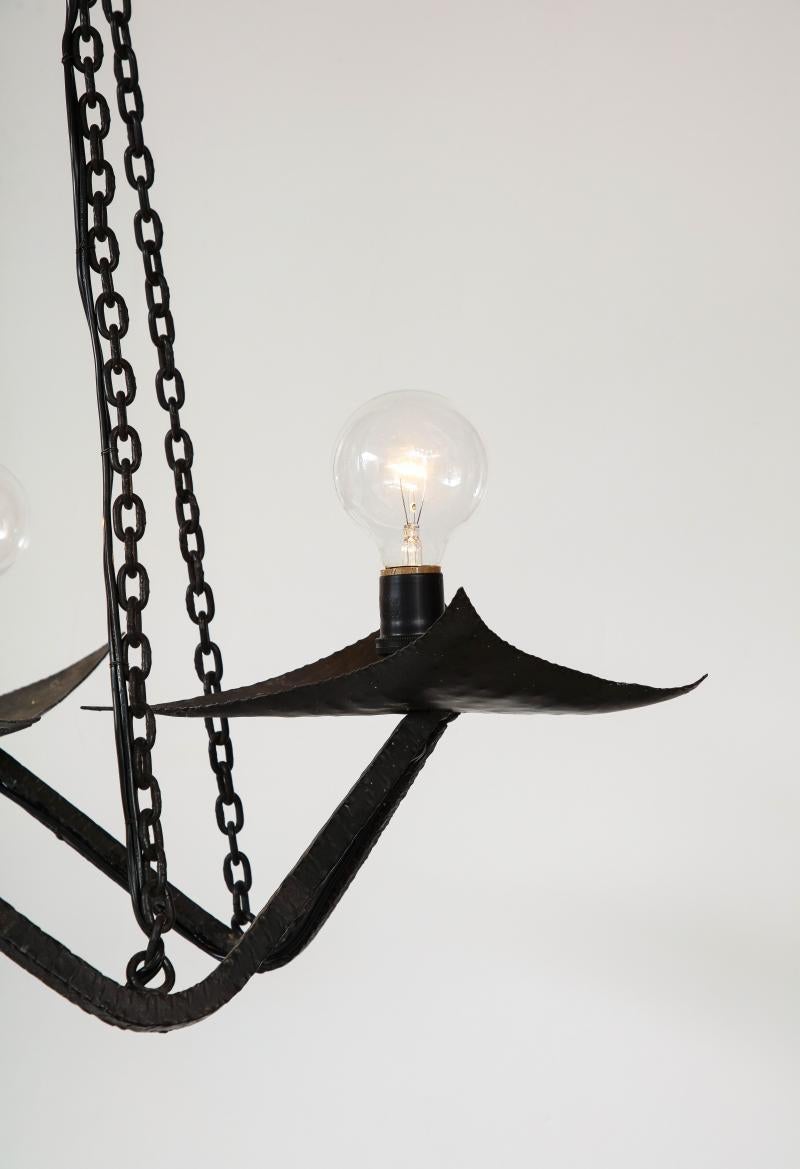 Black Wrought Iron Chandelier in the Manner of Raymond Subes, 20th Century For Sale 5