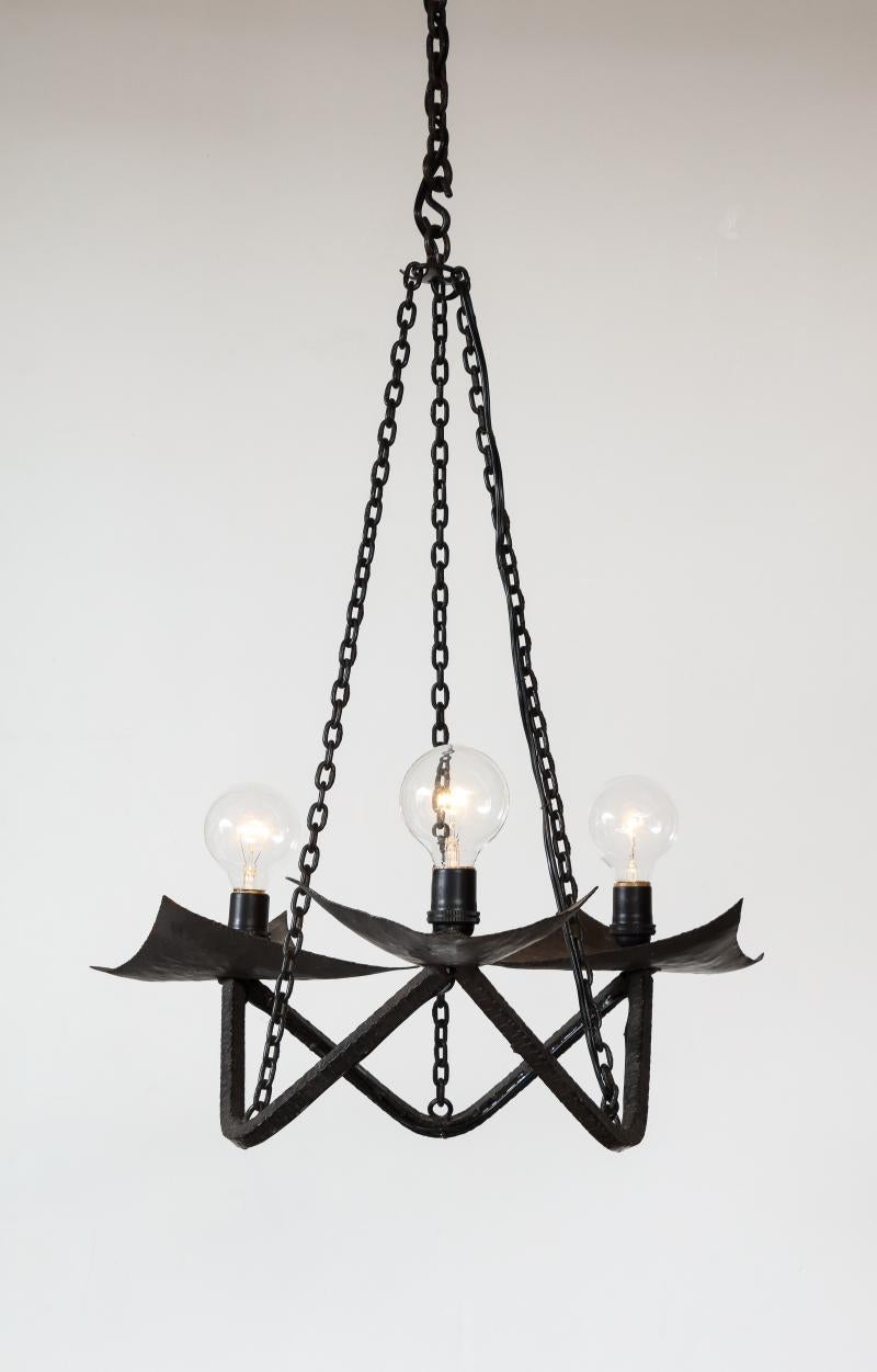 Spanish Black Wrought Iron Chandelier in the Manner of Raymond Subes, 20th Century