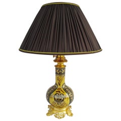 Lampe en faïence Lunville noire, jaune et or, vers 1900