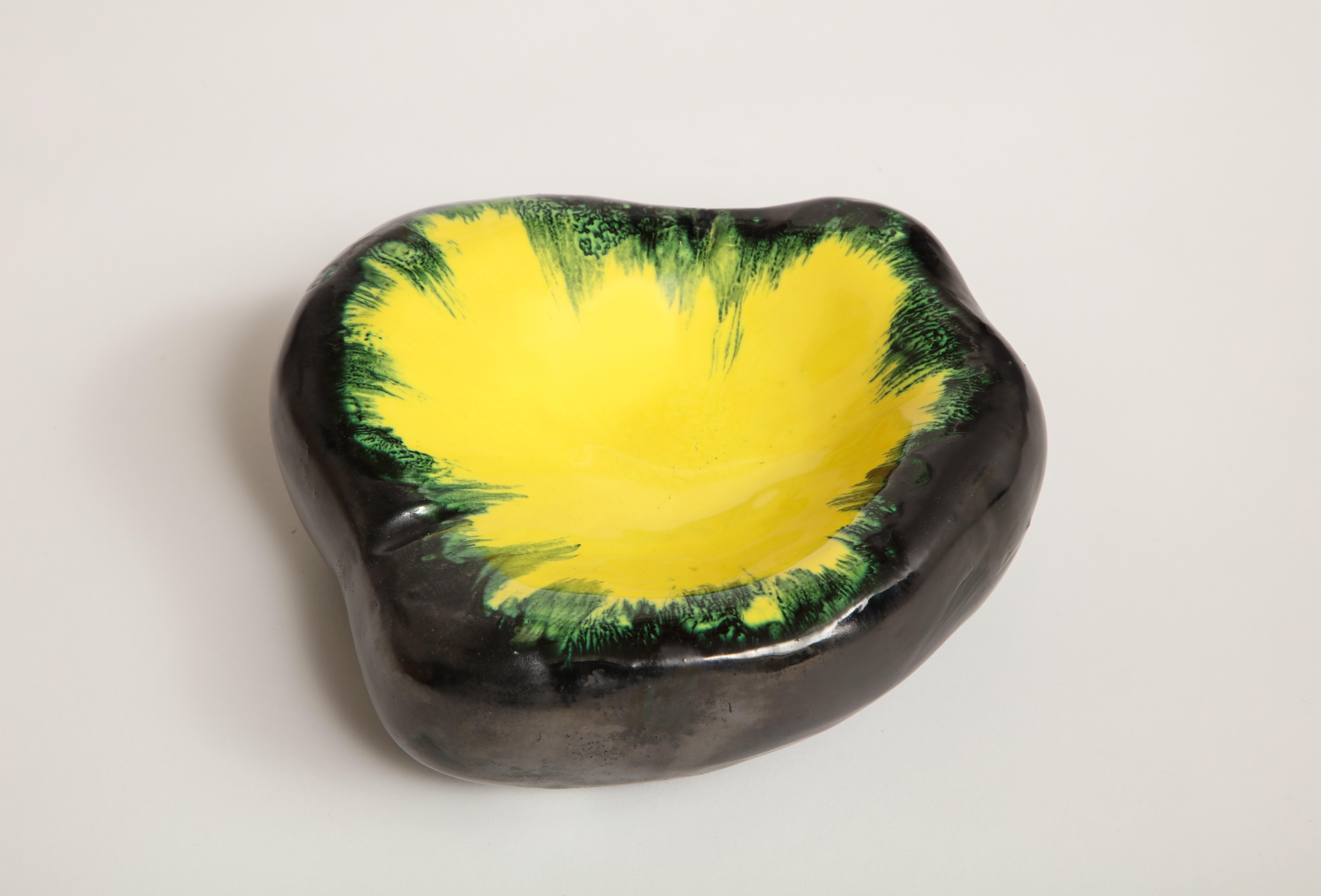 Black, yellow, green ceramic dish in the style of Georges Jouve. Lovely as a catchall or ashtray.