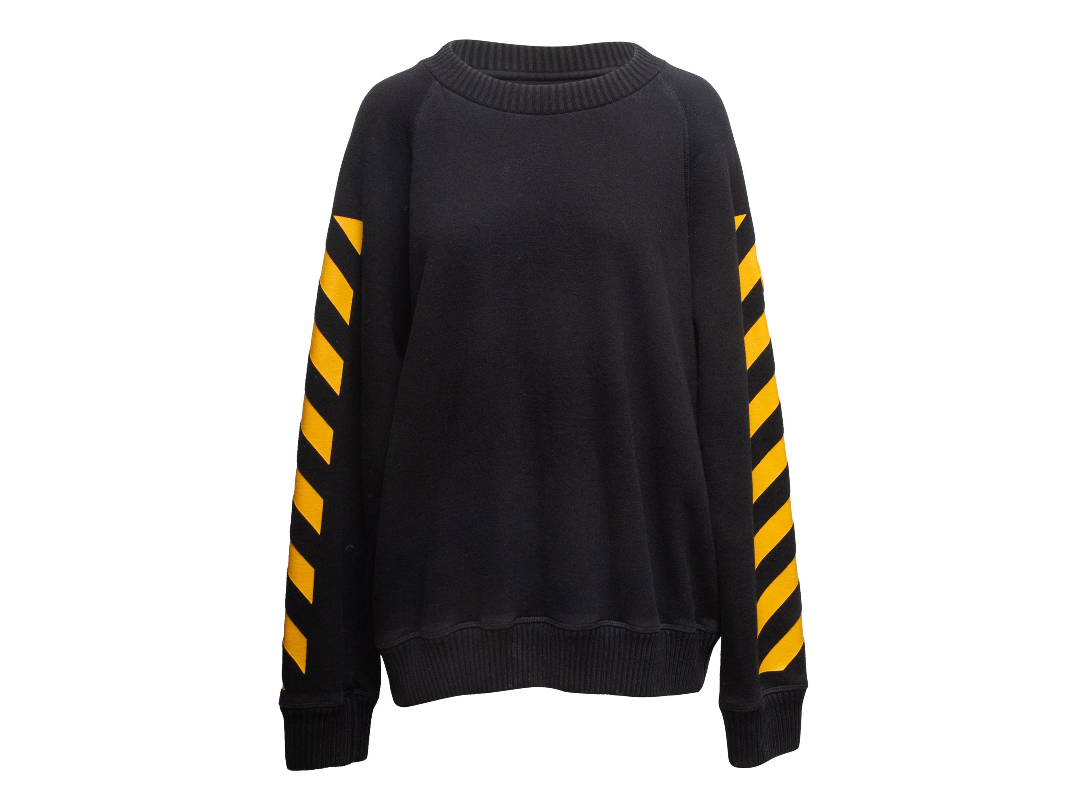 Black and yellow crew neck sweater by Moncler x Off-White. Graphic design at sleeves and back. 44