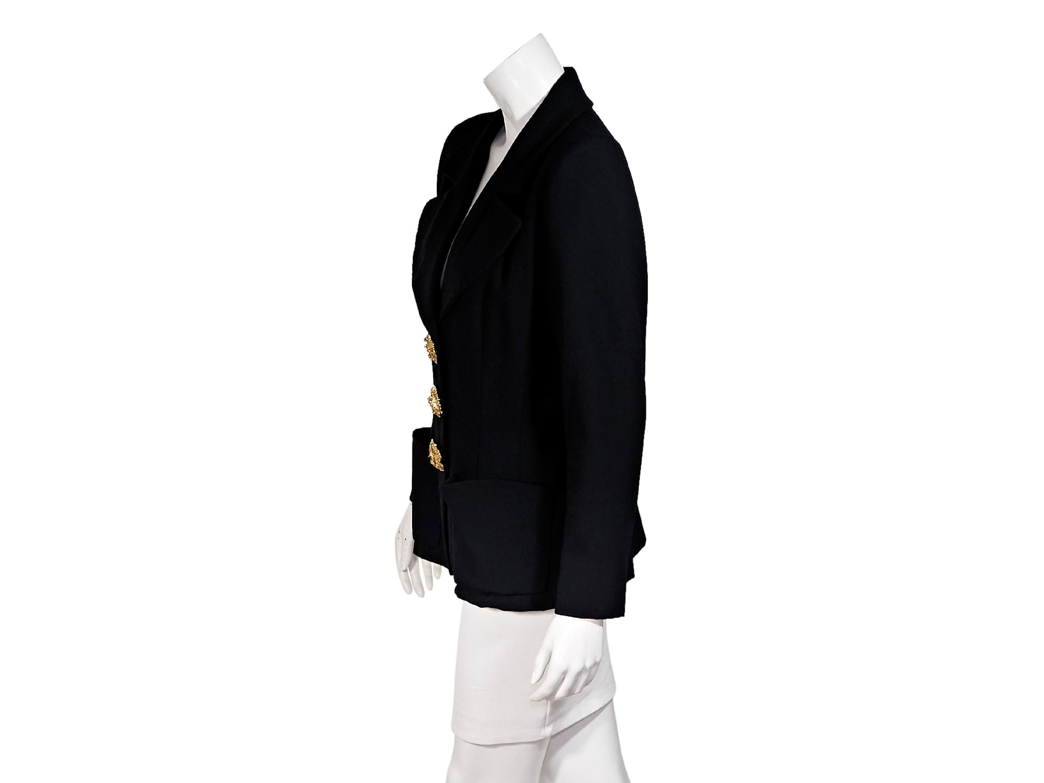 Product details:  Black wool blazer by Yves Saint Laurent Rive Gauche.  Notched lapel.  Long sleeves.  Button-front closure.  Waist patch pockets.  Goldtone hardware.  Label size FR 42.  36