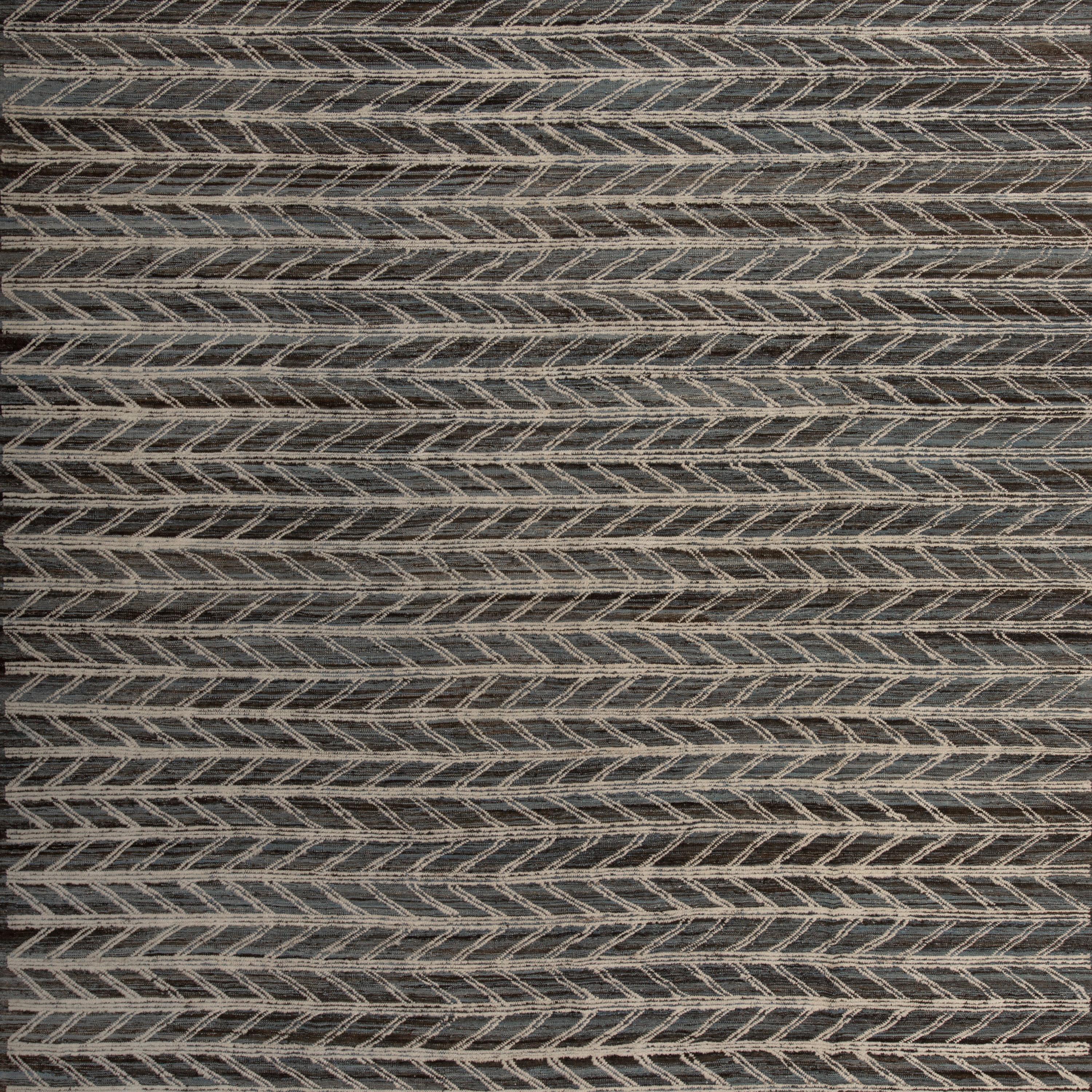 Inspired by the grounding foundations of Earth's natural colors and pure materials, this Zameen Black Modern Wool Rug - 10'9