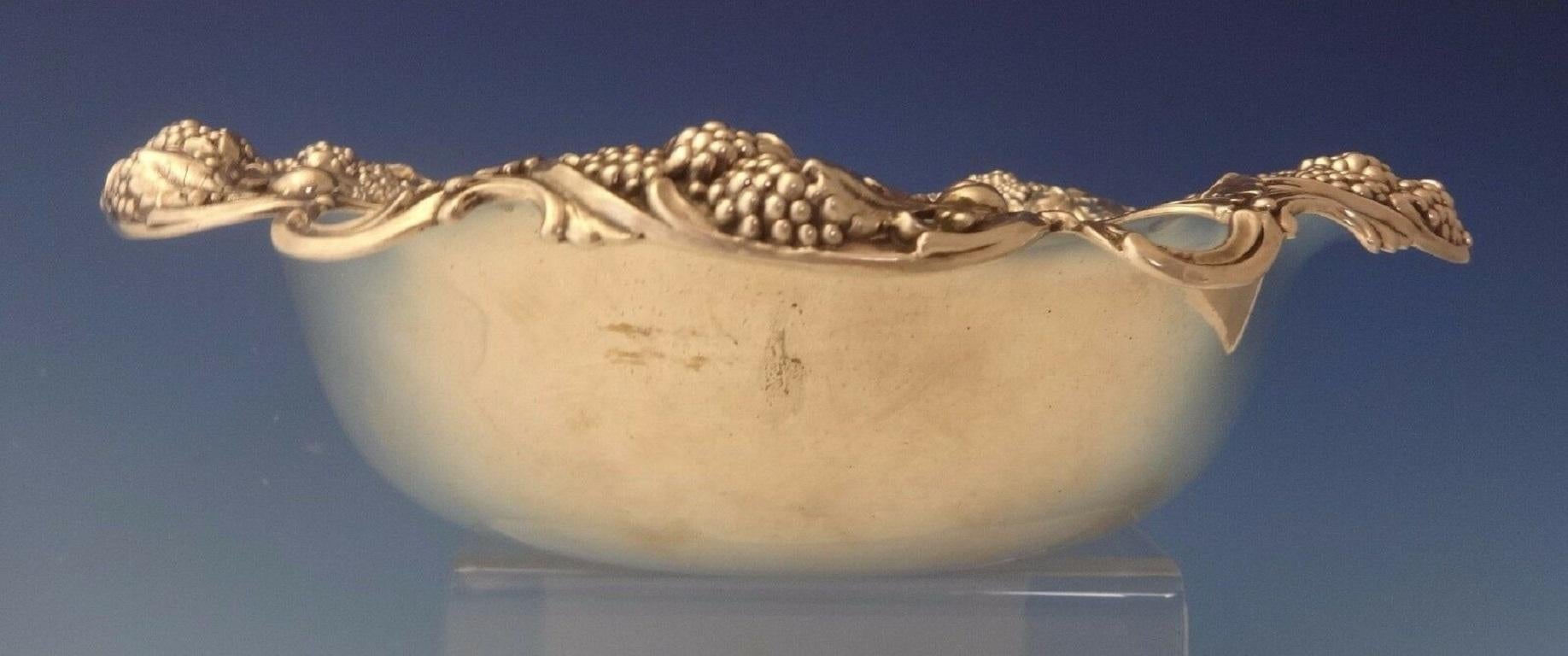 Blackberry by Tiffany & Co. sterling fruit bowl featuring a pierced border of swirled blackberries and leaves. It has a FWB monogram. The piece is marked with a date letter C for 1902-1907 and #16152/2602. It measures 2 5/8 tall, 10 in diameter, and
