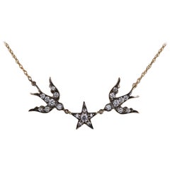 Blackbird and the Snow diamond bird star swallow necklace