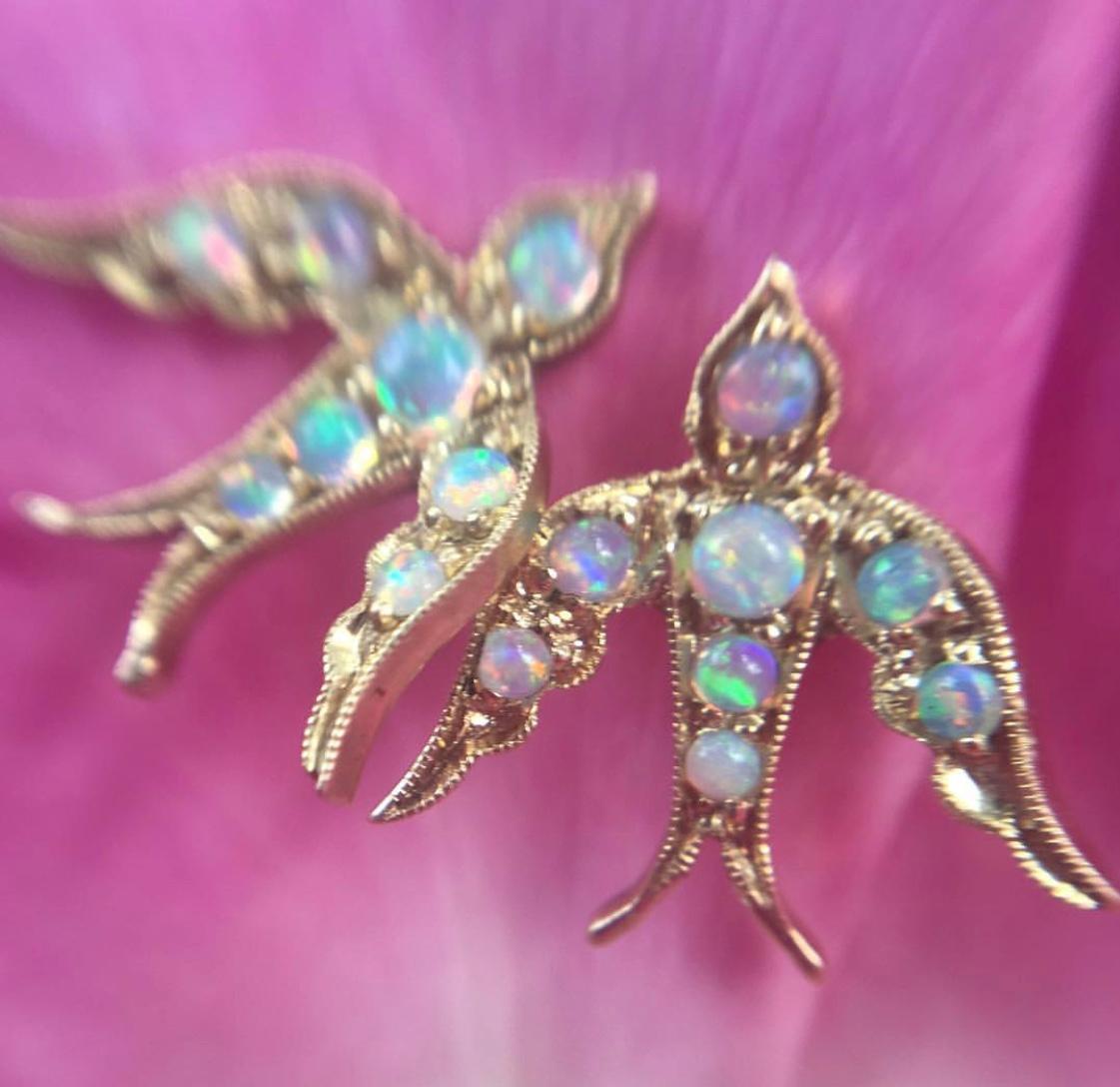 Our delicate and whimsical bird stud earrings are inspired by Victorian charms and are a perfect addition to any collection. Cast in 14k rose gold and set with hand cut Australian crystal opals. Finished with fine milgrain detailing. 14K rose gold