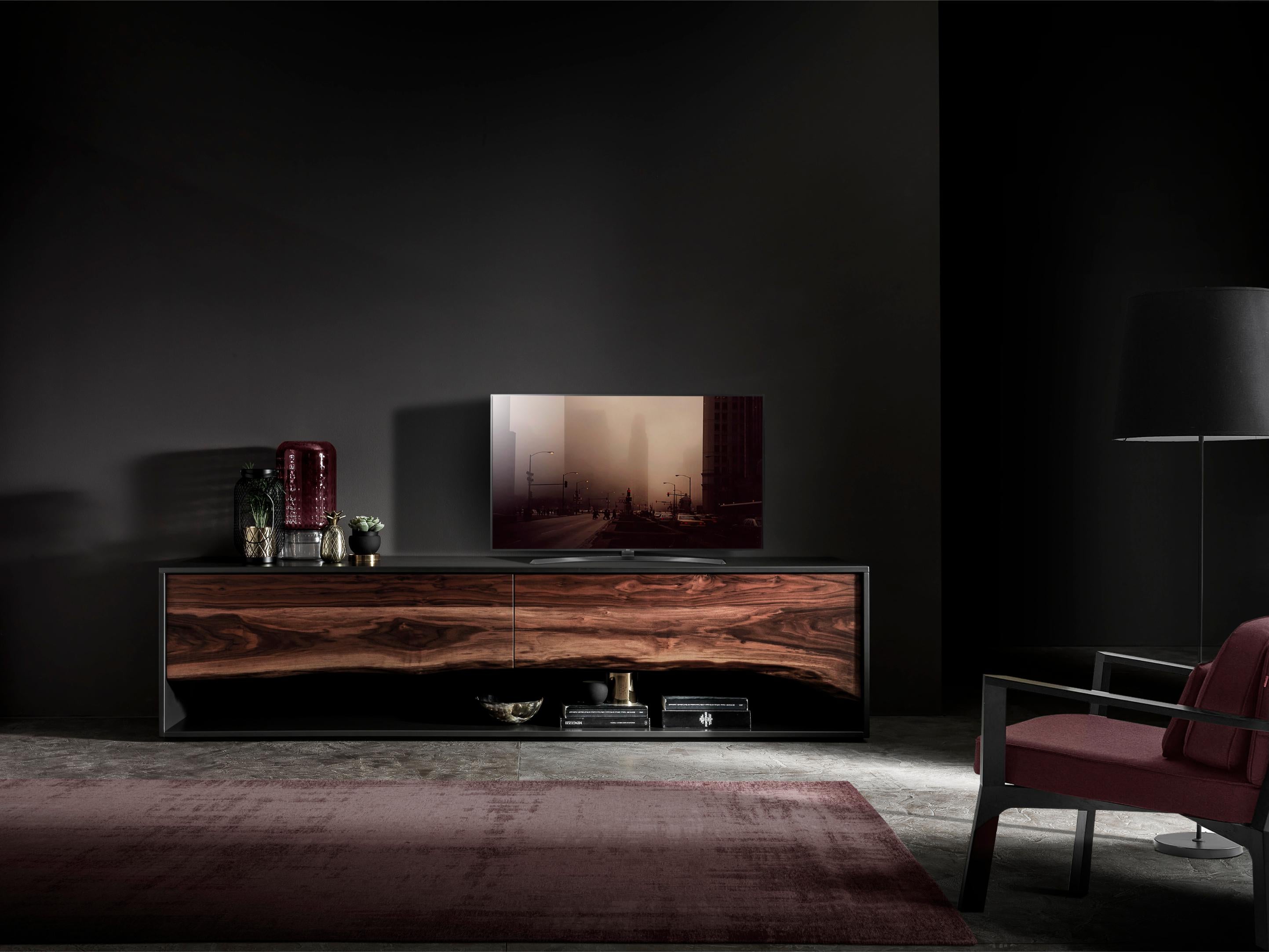 Blackbird Low Drawers Cabinet by Francesco Profili
Dimensions: W 250 x D 50 x H 55 cm 
Materials: Walnut, LEDs.

The cabinet fully reflects the collection core concepts. The essence and nobility of the wood is married with the lacquered look,