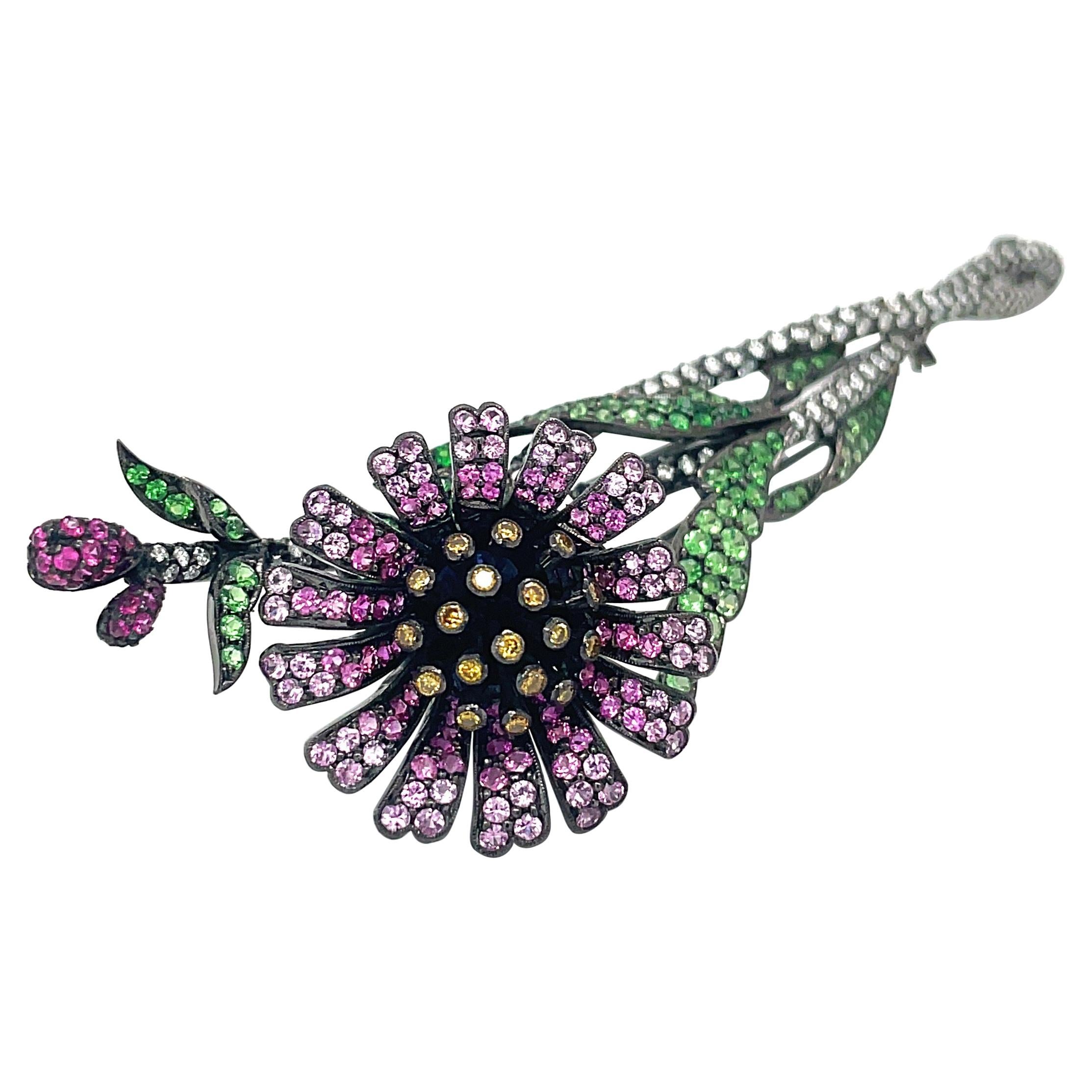 Blackened 18kt Gold Flower Brooch with Diamonds, Pink Sapphires and Tsavorite For Sale